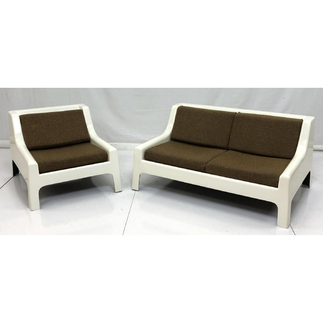 2pc CAPELLINI Fiberglass Love Seat & Lounge Chair: 2pc CAPELLINI Fiberglass Love Seat & Lounge Chair. Cream Molded frame with low profile arms. Tweedy brown fabric cushions. -- dimensions: loveseat: 25.5x52x36--chair: 25.5x30x36
