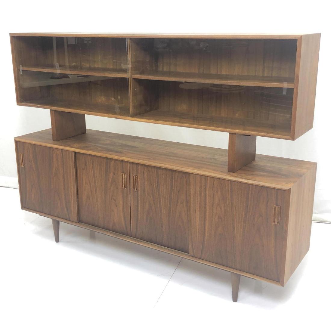 Rosewood Sliding Door Credenza Sideboard. Glass d: Rosewood Sliding Door Credenza Sideboard. Glass door top section. Modernist cabinet on peg legs. 2 parts. -- Dimensions: H: 54 inches: W: 72 inches: D: 18.25 inches ---