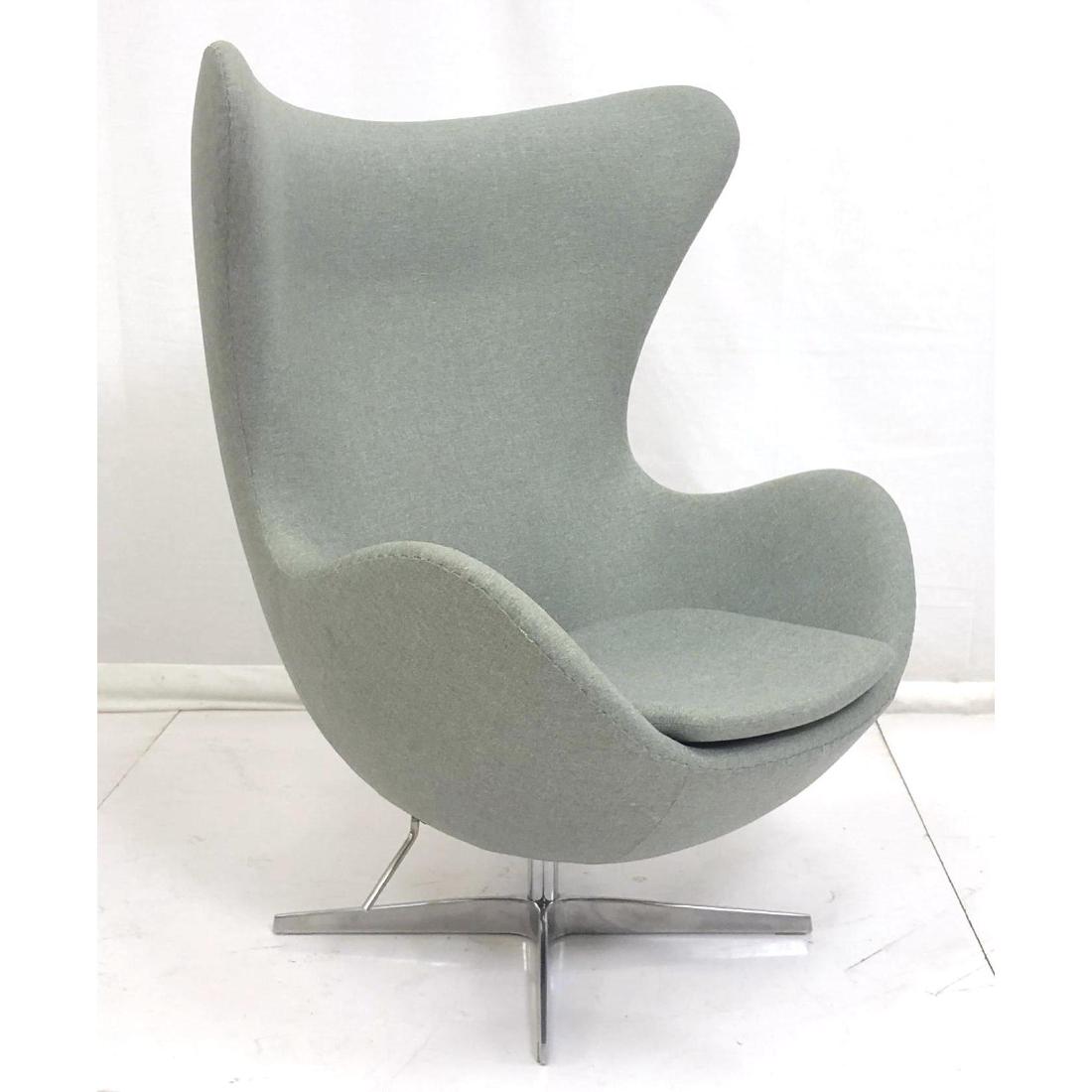 Contemporary Modern Upholstered Swivel Egg Chair.