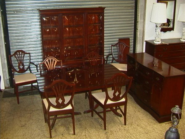 9 pc Mahogany Shield back Dining room set with Bub: 9 pc Mahogany Shield back Dining room set with Bubble glass china. One Leaf for Duncan Phyfe table. Dimensions: Condition: Very Good Condition. US Shipping charge: Pick up or shipping quote from outsi