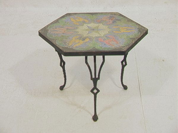 Mosaic Carved tile top Iron table with claw feet.: Mosaic Carved tile top Iron table with claw feet. 6 sided Dimensions: H: 18.5 inches: W: 22.5 inches: Condition: Good condition. Scratches on top. Metal has some rust. US Shipping charge: $50