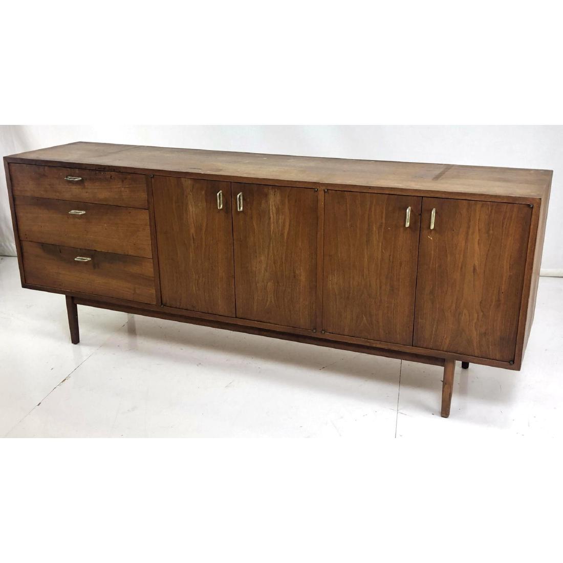 American Modern Credenza Sidebioard Raised on Peg: American Modern Credenza Sidebioard Raised on Peg Legs. Metal pulls.-- Dimensions: H: 30 inches: W: 77.5 inches: D: 18 inches ---