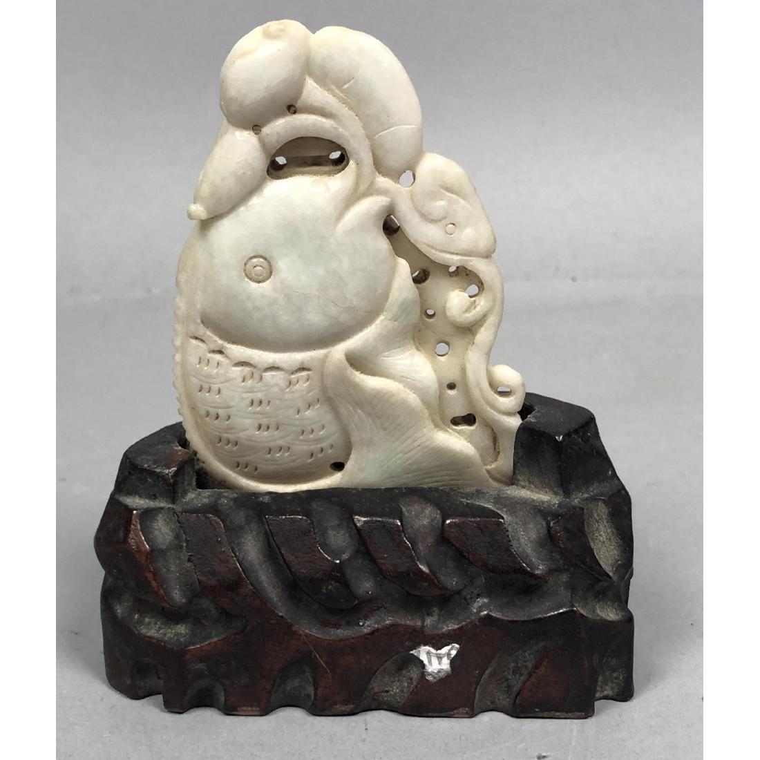 Carved Hardstone Figural Fish Chinese Sculpture.: Carved Hardstone Figural Fish Chinese Sculpture. Stylized fish with lotus flowers in carved wood custom base. -- Dimensions: H: 5.25 inches: W: 4.5 inches: D: 1.75 inches ---