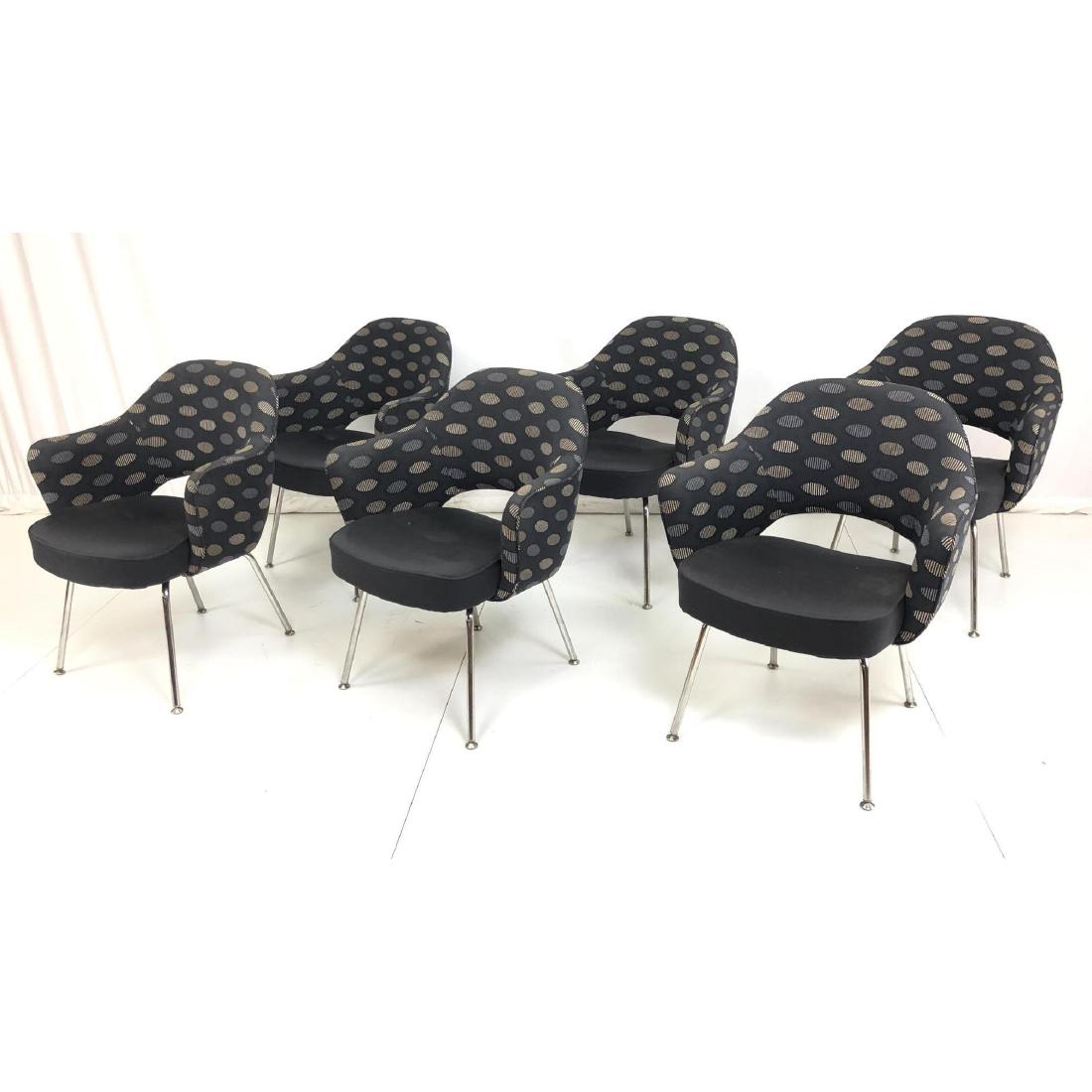 6pc Eero Saarinen KNOLL INC Executive Arm Chairs.: 6pc Eero Saarinen KNOLL INC Executive Arm Chairs. Black seats with black, cream and gray patterned backs. Chrome tube legs. Knoll label.-- Dimensions: H: 31 inches: W: 26.25 inches: D: 24 inches ---