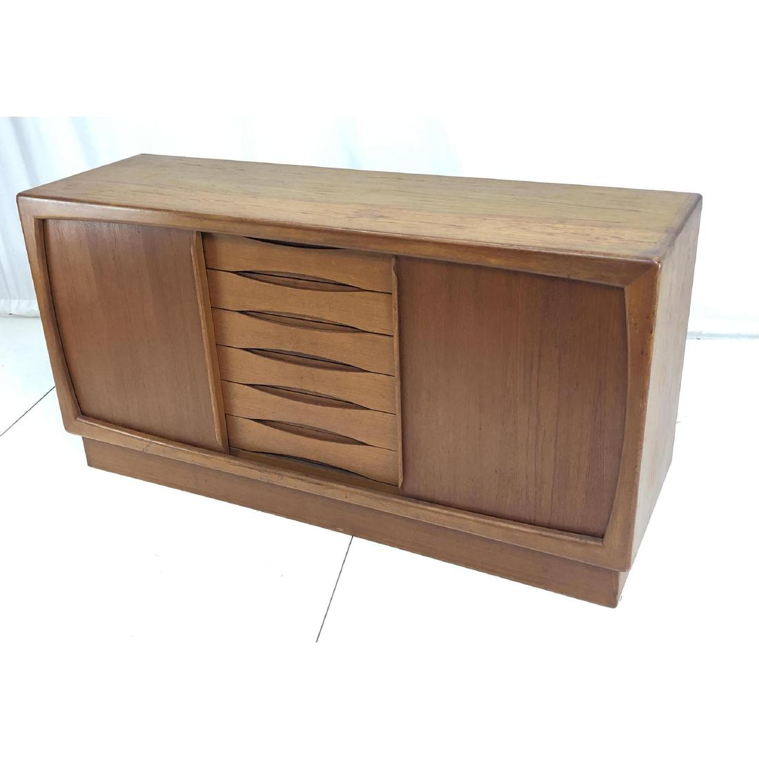 Danish Modern Teak Credenza Sideboard. Sliding pa: Danish Modern Teak Credenza Sideboard. Sliding panels. Raised on platform base. -- Dimensions: H: 32.5 inches: W: 63 inches: D: 19.5 inches ---