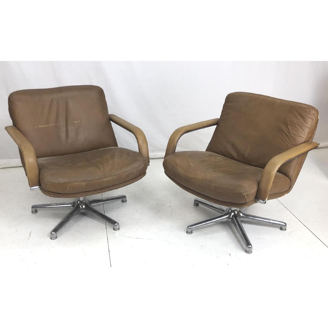 Pr ARTIFORT Swivel Modernist Office Chairs. Leat: Pr ARTIFORT Swivel Modernist Office Chairs. Leather Seats and Backs on Aluminum Bases. Marked. -- Dimensions: H: 30 inches: W: 28 inches: D: 28 inches ---