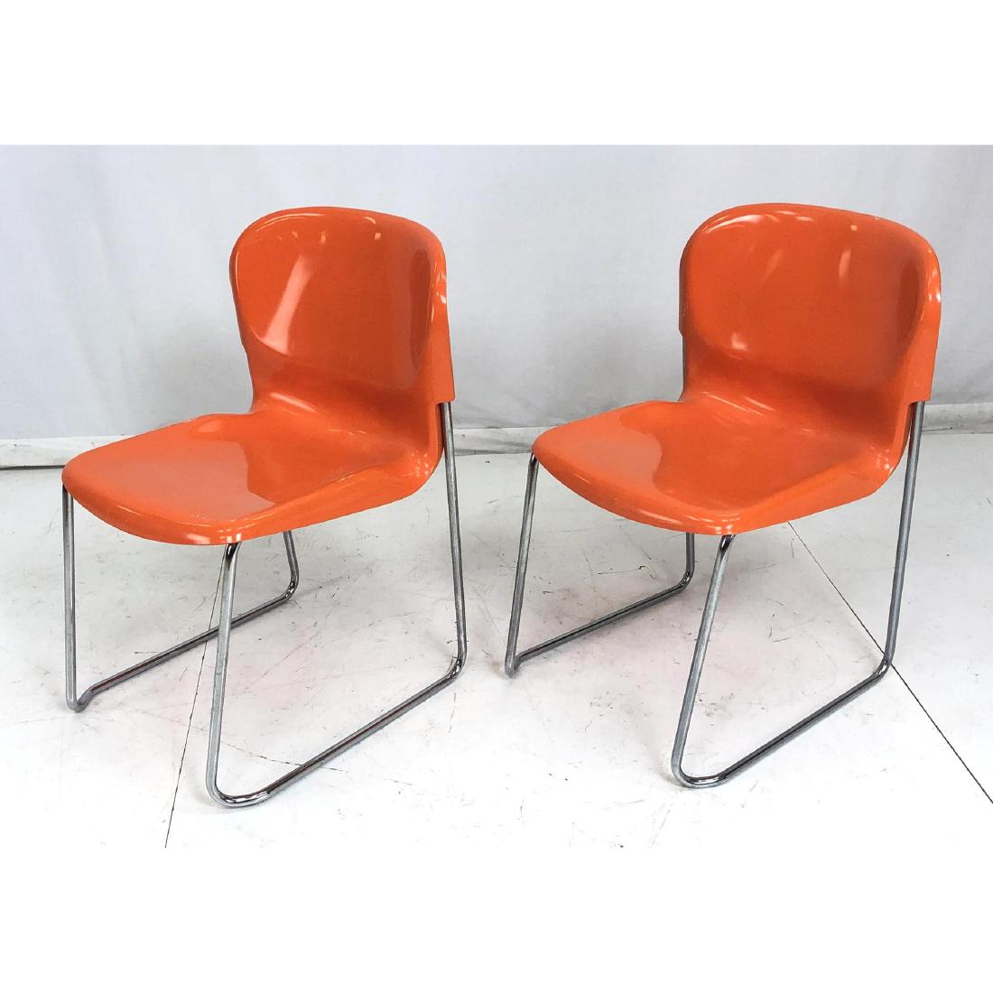 Pr Chrome Orange Molded Plastic Stacking Chairs. (1 of 11)