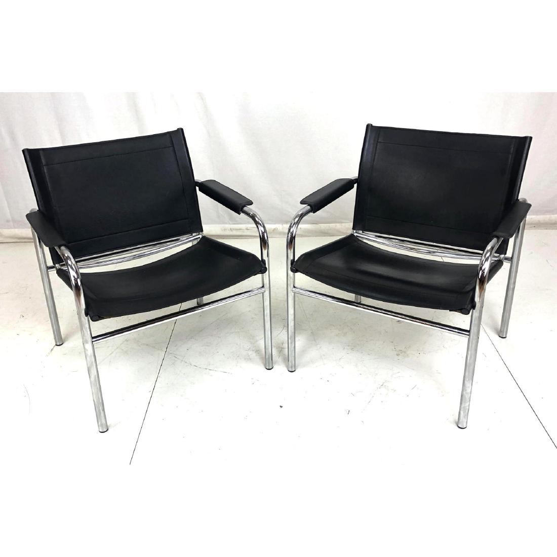 Pr Marcel Breuer style Chrome Arm Lounge Chairs.: Pr Marcel Breuer style Chrome Arm Lounge Chairs. Black Leather. -- Dimensions: H: 32 inches: W: 25 inches: D: 25 inches ---