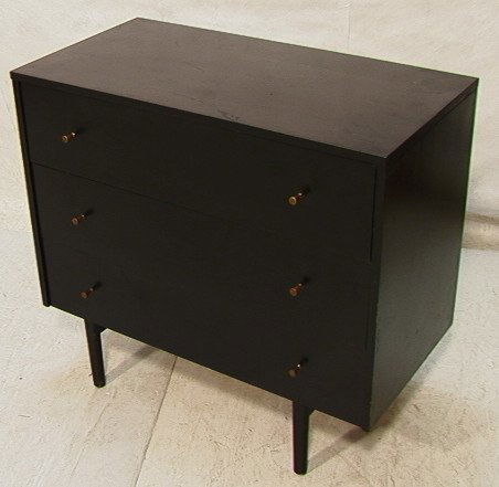 Paul McCobb Planner Group Black Dresser. 3 Drawers: Paul McCobb Planner Group Black Dresser. 3 Drawers with brass pulls. Foil Label Dimensions: H: 32 inches: W: 36 inches: D: 19 inches Condition: Overall wear. Appears to have replaced legs. US Shipping