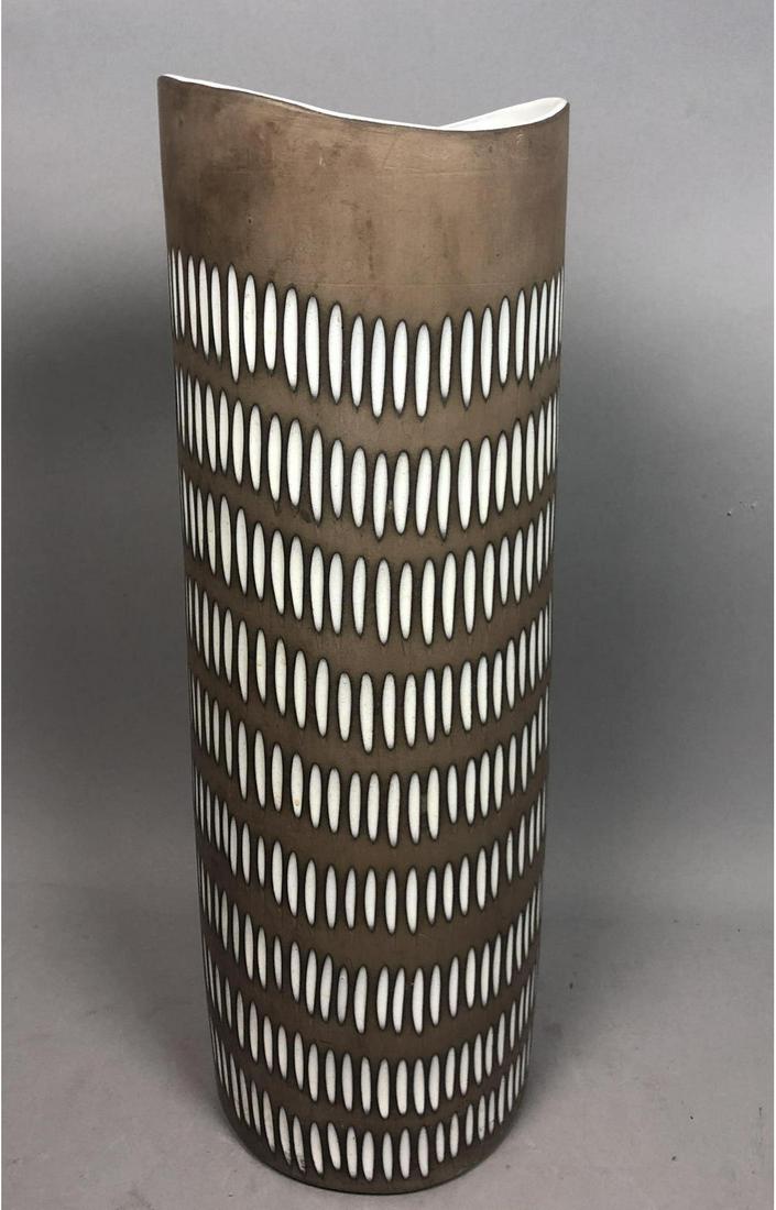 Ingrid Atterberg NEGRO Floor Vase. Upsala Ekeby.: Ingrid Atterberg NEGRO Floor Vase. Upsala Ekeby. Lg Mid Century Artist Signed Cylindrical Vase. Brown surface with inset textured design. -- Dimensions: H: 22 inches: W: 8 inches: D: 8 inches ---