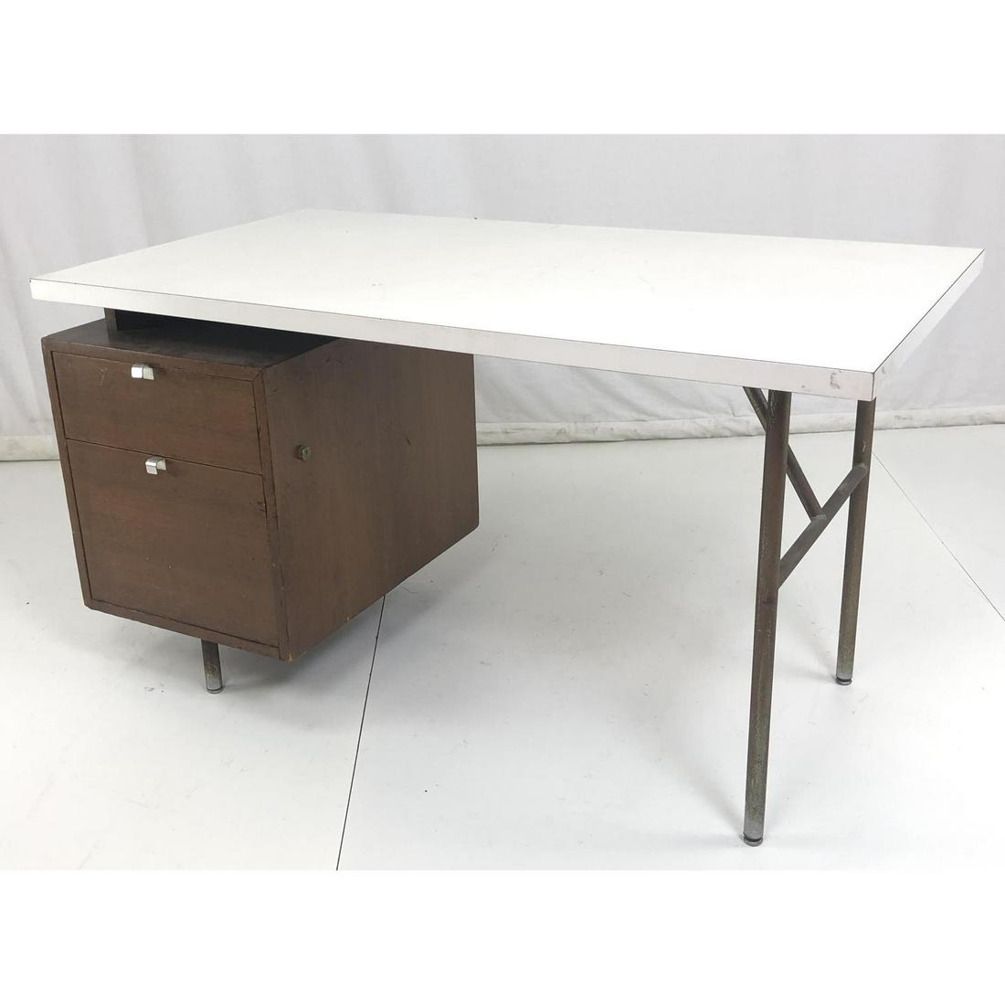GEORGE NELSON for HERMAN MILLER Desk. White lamin: GEORGE NELSON for HERMAN MILLER Desk. White laminate top. Silver foil label.-- Dimensions: H: 30 inches: W: 54 inches: D: 30 inches ---