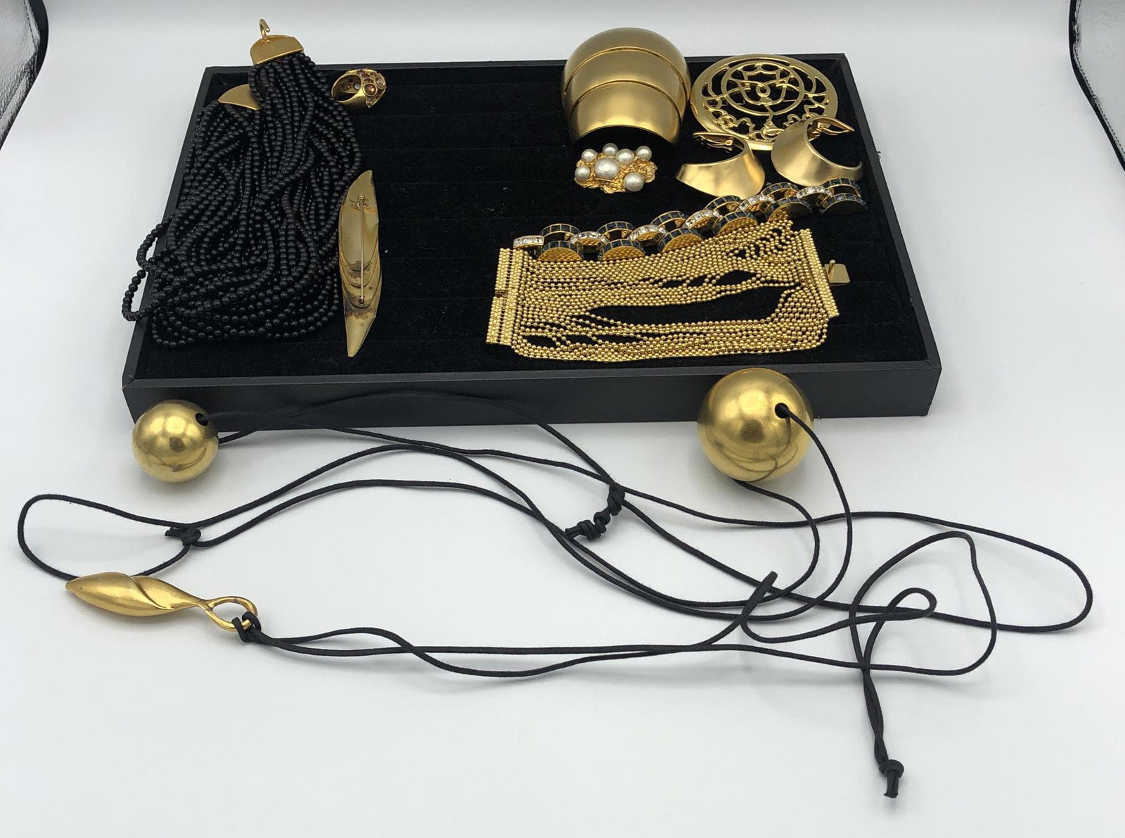 13 Pc Gold tone Designer Costume Jewelry. MARY Mc: 13 Pc Gold tone Designer Costume Jewelry. MARY McFADDEN Gold Tone Pearl Brooch, Round Disk Flower Brooch. Both Signed. Pr Robert Lee Morris Clip Earrings. Robert Lee Morris Style Armadillo Pin. Multi