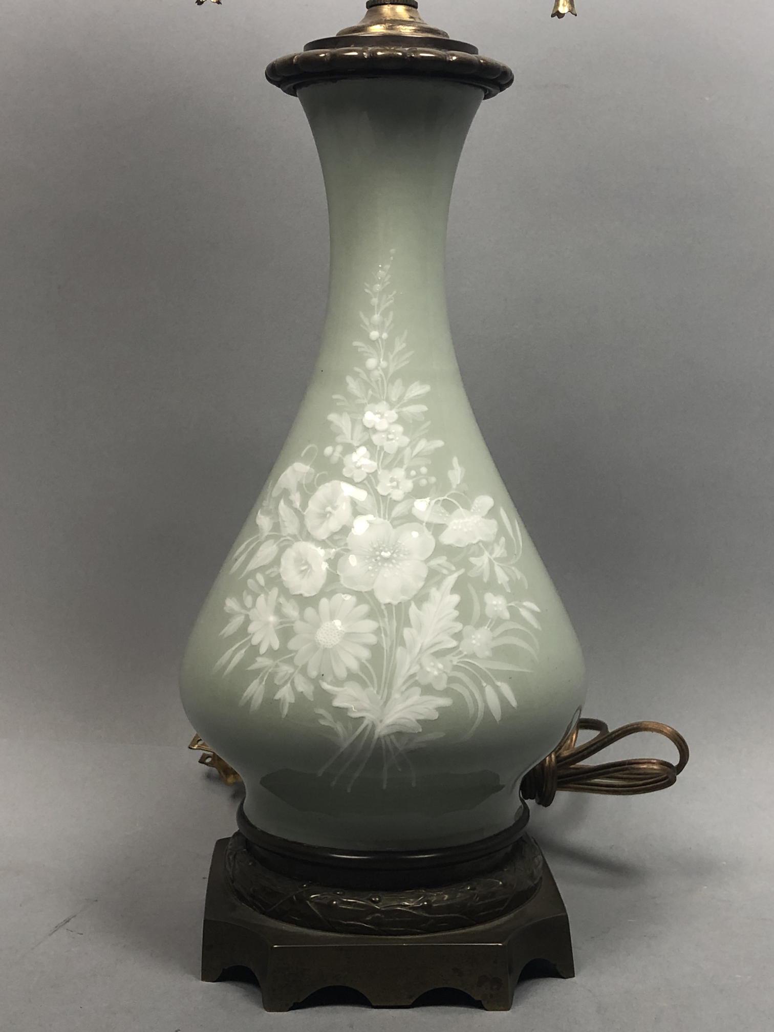 Antique Pate sur Pate Table Lamp. Jadite Porcelai: Antique Pate sur Pate Table Lamp. Jadite Porcelain with Raised White Floral Decoration. Brass accents and glass finial. -- Dimensions: H: 25 inches: W: 6 inches: D: 6 inches ---