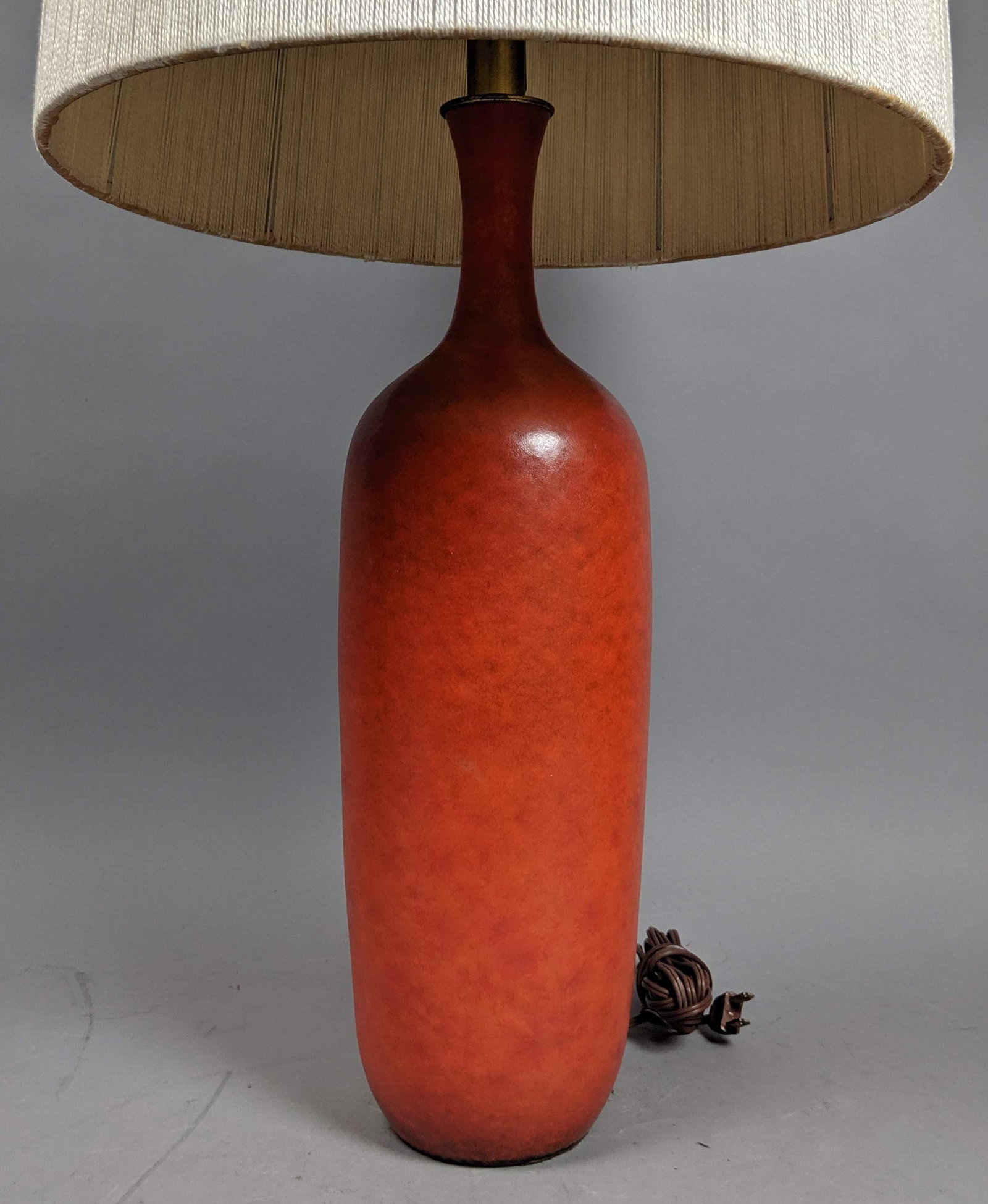 LEE ROSEN for DESIGN TECHNICS Orange Lamp. Red Or: LEE ROSEN for DESIGN TECHNICS Orange Lamp. Red Orange Bottle Form Ceramic Lamp. Stamped Logo mark. Pottery dimensions: 17.5"h x 5.5"d. -- Dimensions: H: 32.25 inches: W: 13 inches: D: 13 inches ---