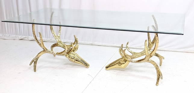 ALAIN CHERVET Signed Brass Antler Dining Table. F: ALAIN CHERVET Signed Brass Antler Dining Table. Figural sculptural deer heads with textured antlers support beveled glass top. Signed CHERVET 1984. -- Dimensions: H: 29 inches: W: 84 inches: D: 42 inc