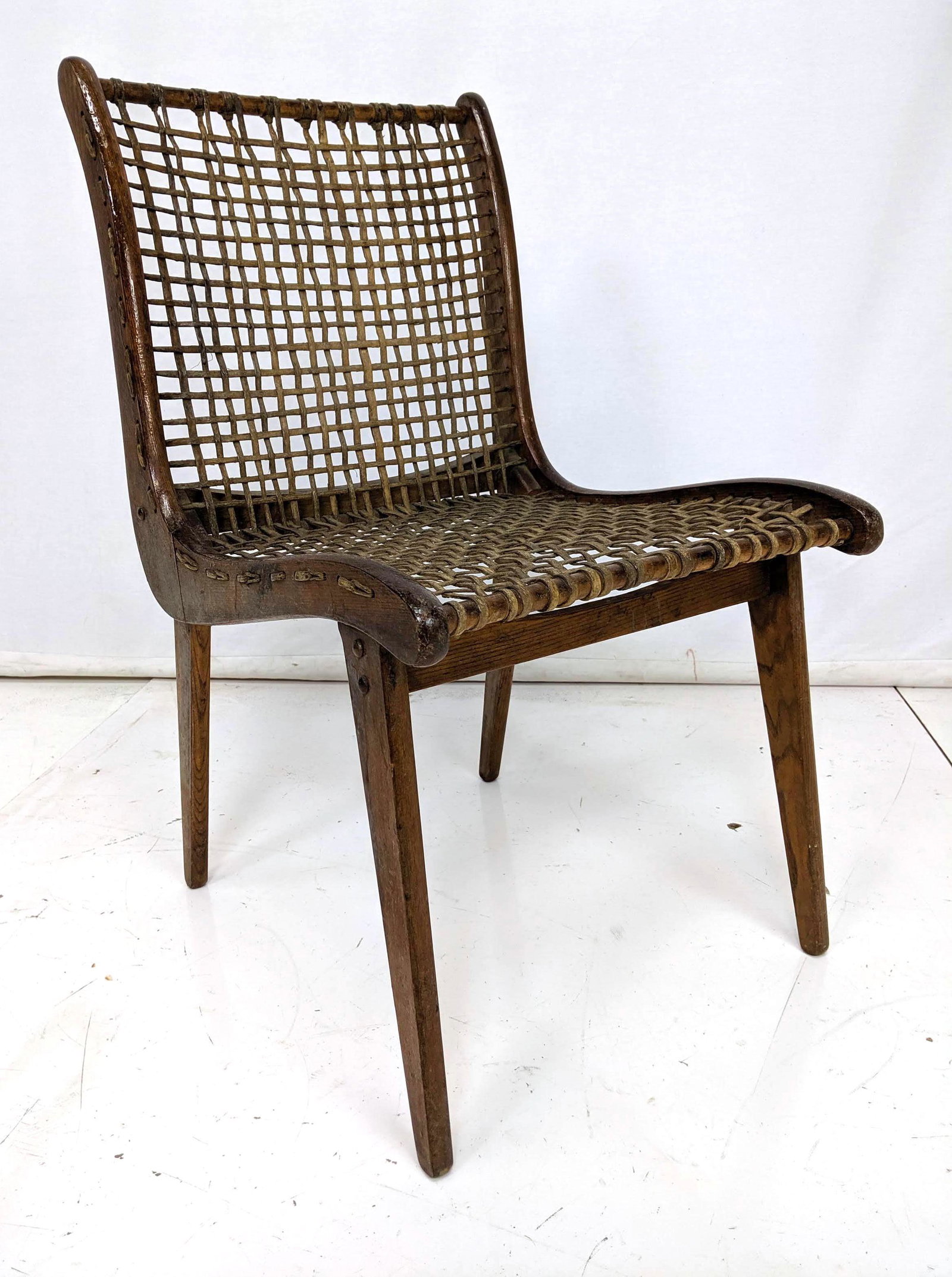 VERMONT TUBBS Woven Lounge Chair. Modernist Risom style: VERMONT TUBBS Woven Lounge Chair. Modernist Risom style frame with woven rawhide webbing. Marked. -- Dimensions: H: 33 inches: W: 18.5 inches: D: 20.5 inches ---