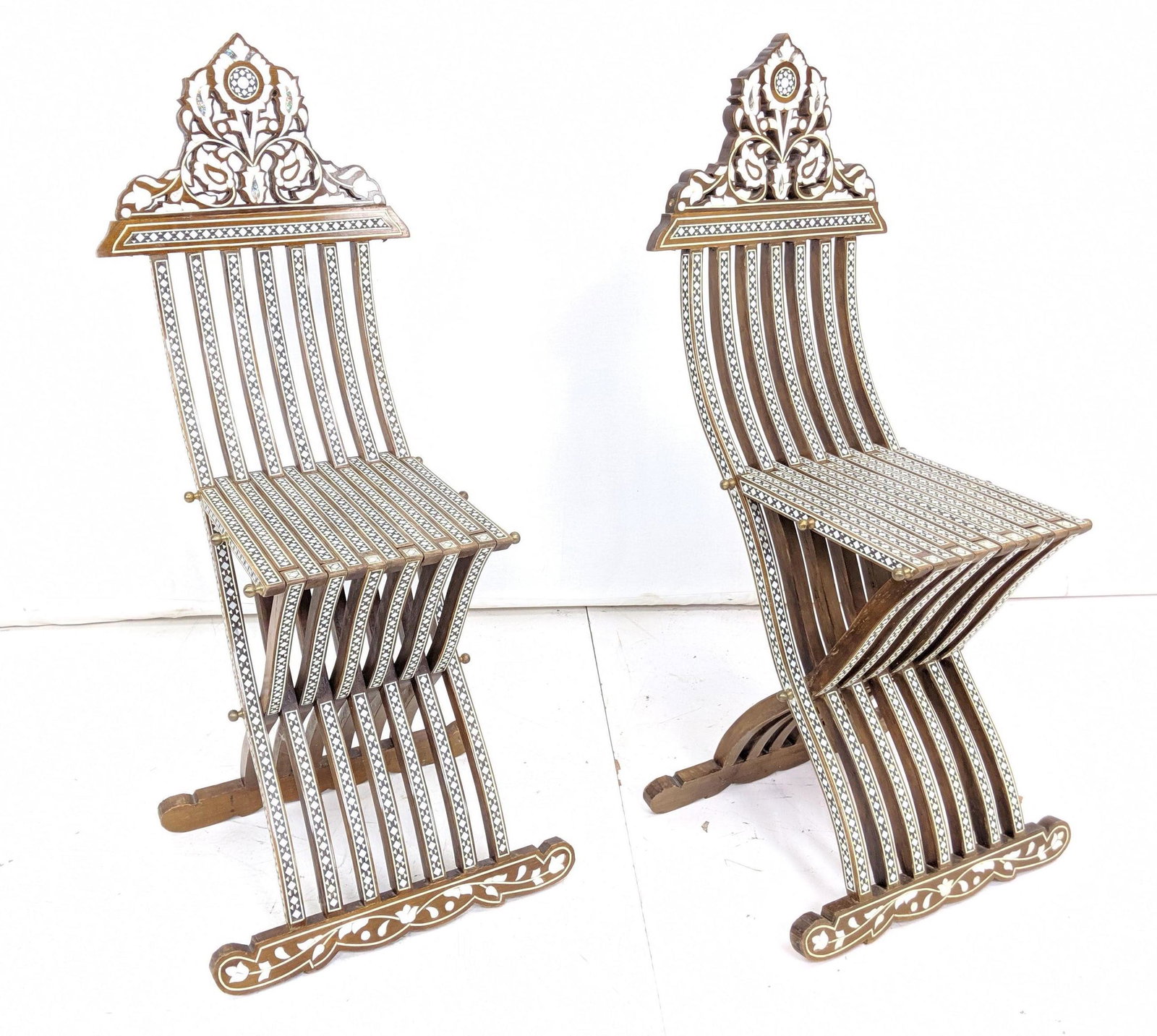 Pr Moorish Maharajah Inlaid Side Chairs. Inlaid with mo: Pr Moorish Maharajah Inlaid Side Chairs. Inlaid with mother of pearl & bone inlay. Brass finials. Highly decorative ornate chairs. -- Dimensions: H: 40.25 inches: W: 16 inches: D: 18.5 inches ---