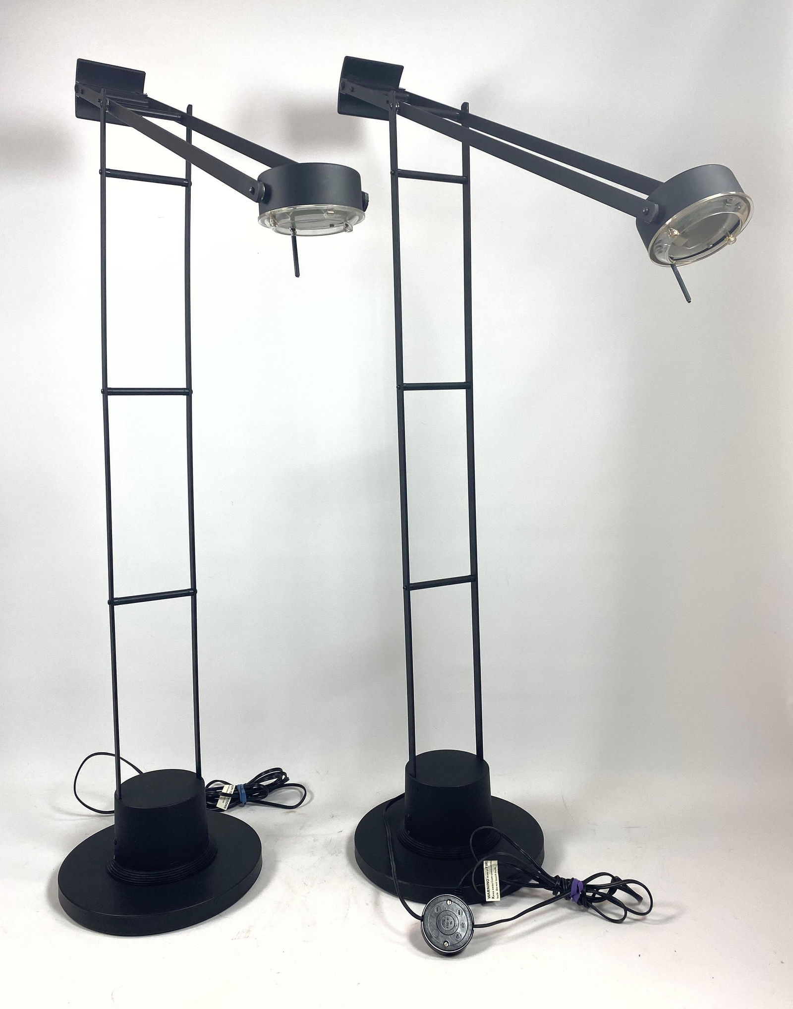 Pr Italian Style Cantilever Balance Floor Lamps. Black: Pr Italian Style Cantilever Balance Floor Lamps. Black metal frame with small round light. Artemide "Tizio" style. Not marked. -- Dimensions: H: 48 inches: W: 26.5 inches: D: 10 inches ---