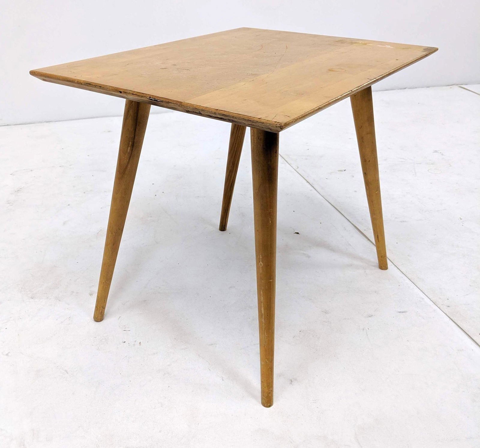 PAUL McCOBB Blond Maple Side Table. PLANNER GROUP. Tall: PAUL McCOBB Blond Maple Side Table. PLANNER GROUP. Tall angled maple tapered legs. -- Dimensions: H: 20 inches: W: 24 inches: D: 18 inches ---