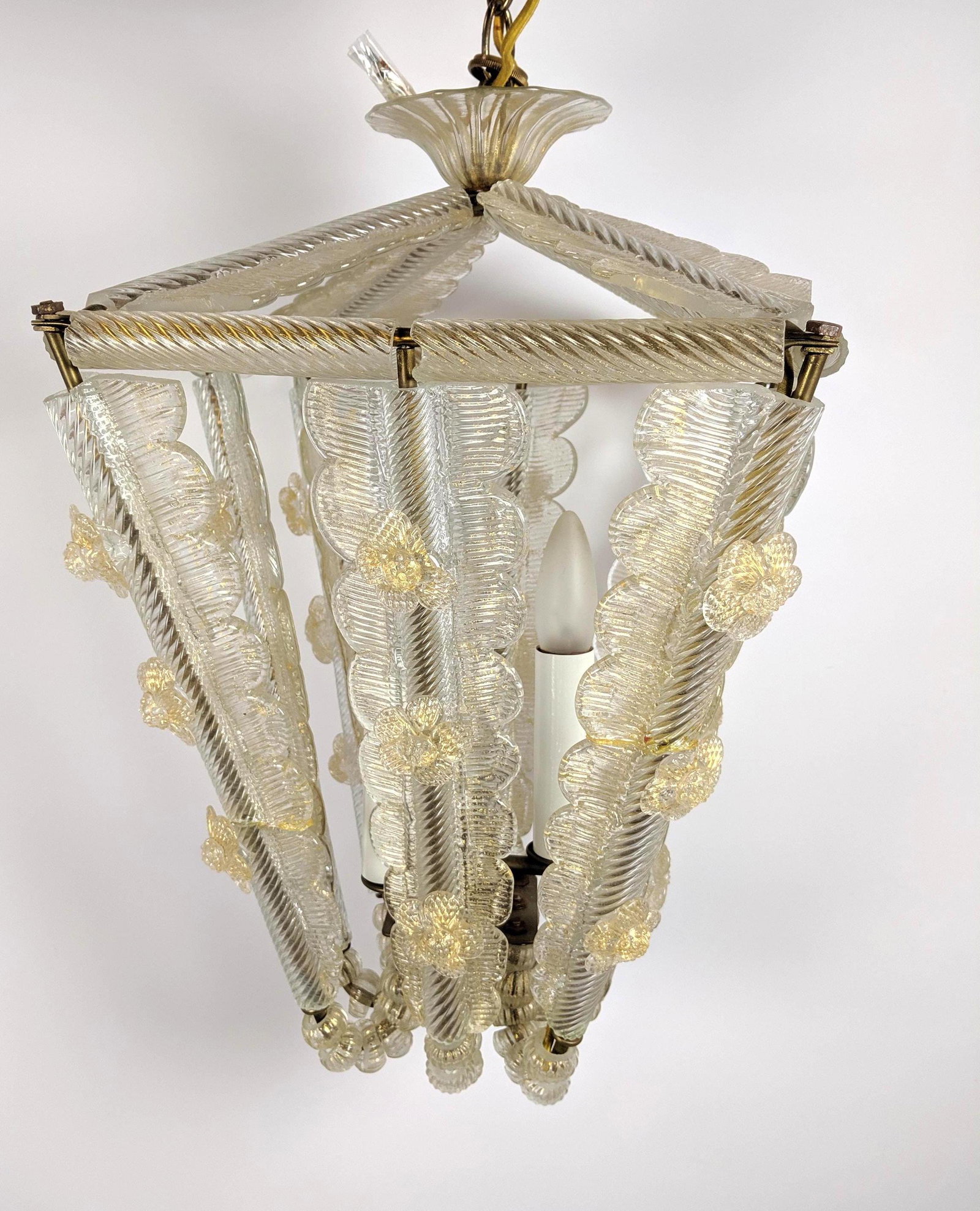 Murano Italian Art Glass Four Sided Chandelier Pendant: Murano Italian Art Glass Four Sided Chandelier Pendant Light. Art Glass columns with floral elements. Ridged glass beads. Metal armature-- Dimensions: H: 20 inches: W: 13 inches: D: 13 inches ---