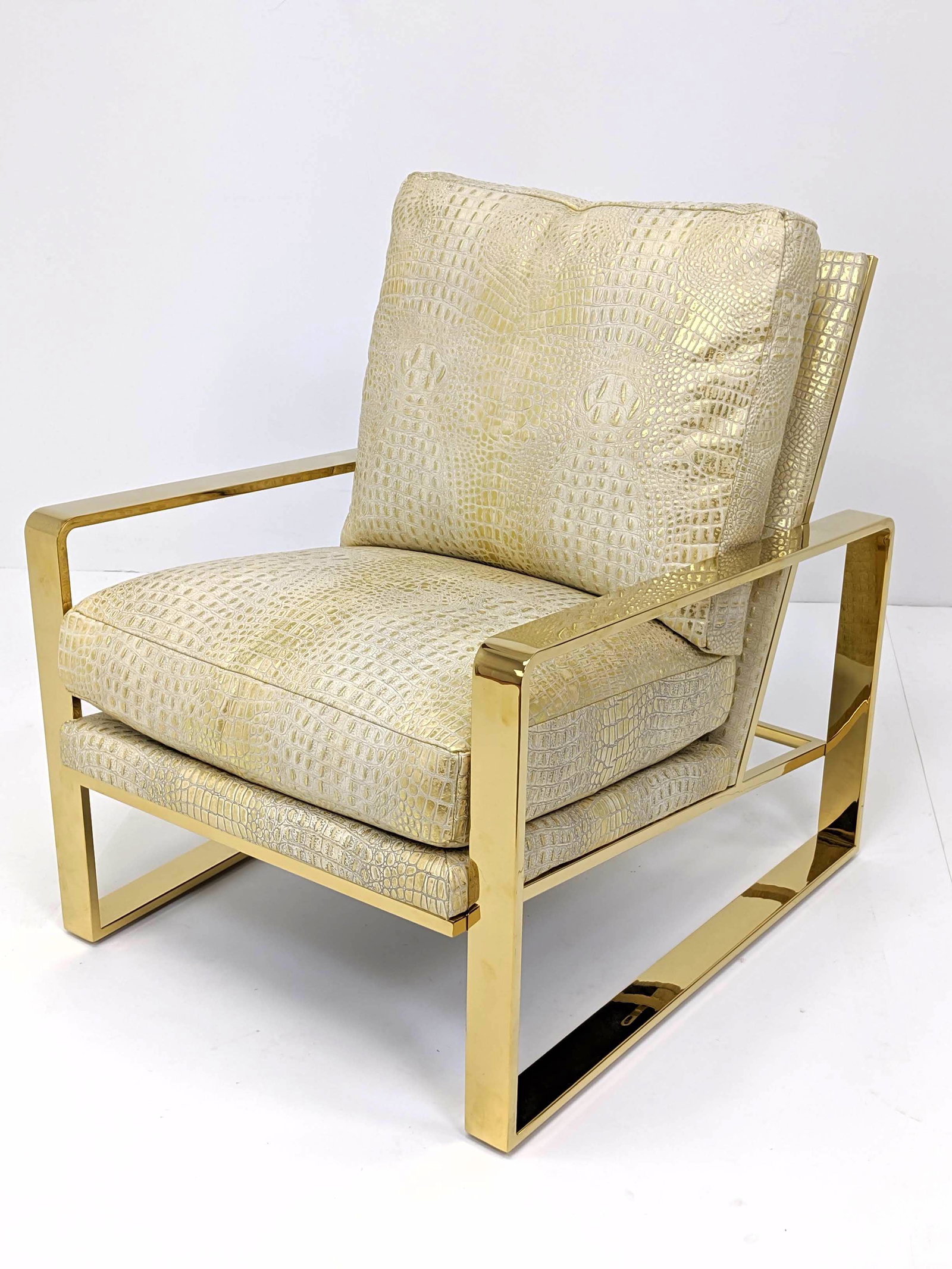 BERNHARDT Modernist Brass Lounge Chair. Heavy wide flat: BERNHARDT Modernist Brass Lounge Chair. Heavy wide flat brass open arm frame. Faux Crocodile Upholstery in Cream with Gold Highlights. Marked. Milo Baughman Style. -- Dimensions: H: 36 inches: W: 28.5