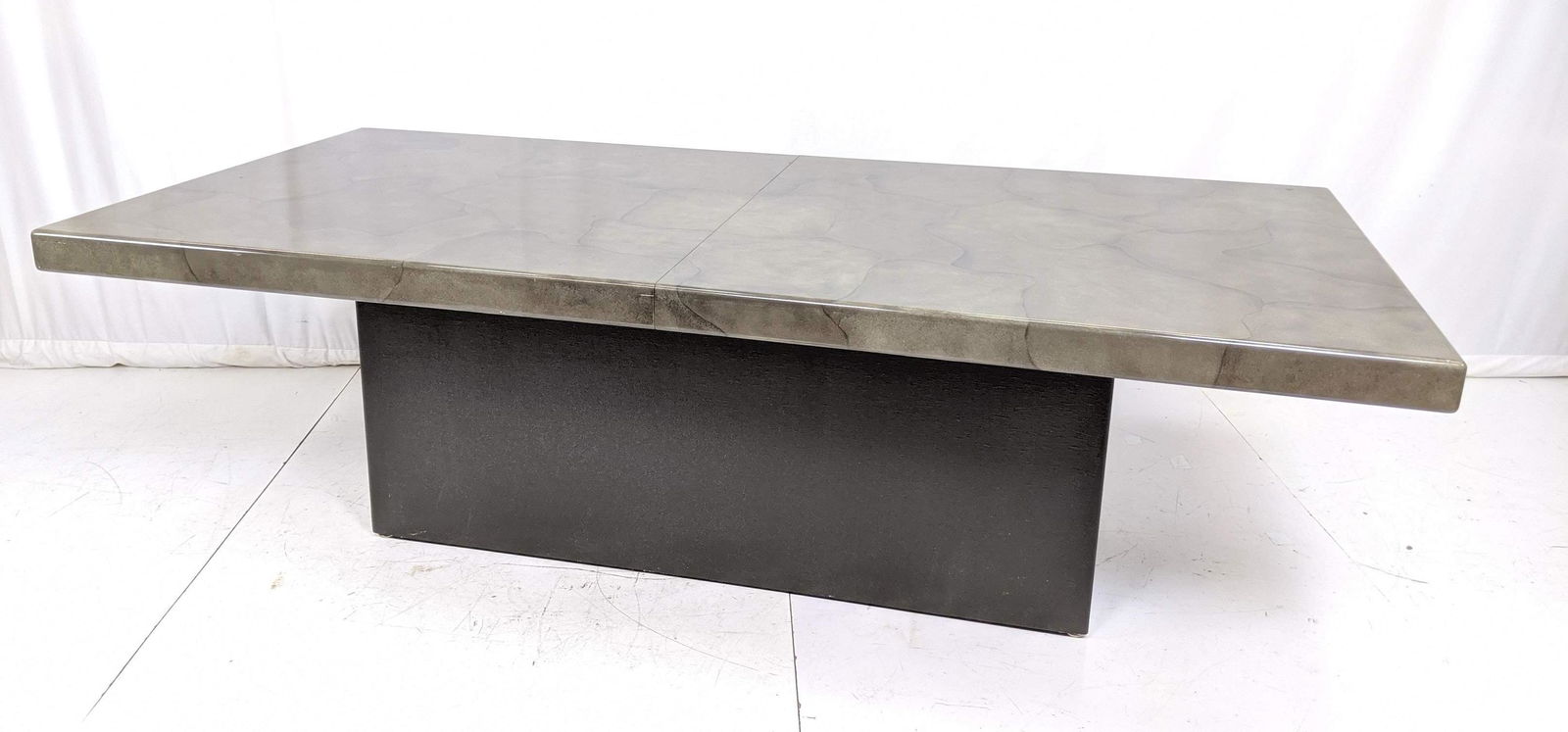 Large Karl Springer style Faux Goatskin Dining Table. G: Large Karl Springer style Faux Goatskin Dining Table. Gray grass cloth base. Two 20" leaves. Includes original invoice for $4200.-- Dimensions: H: 29 inches: W: 46 inches: D: 96 inches ---