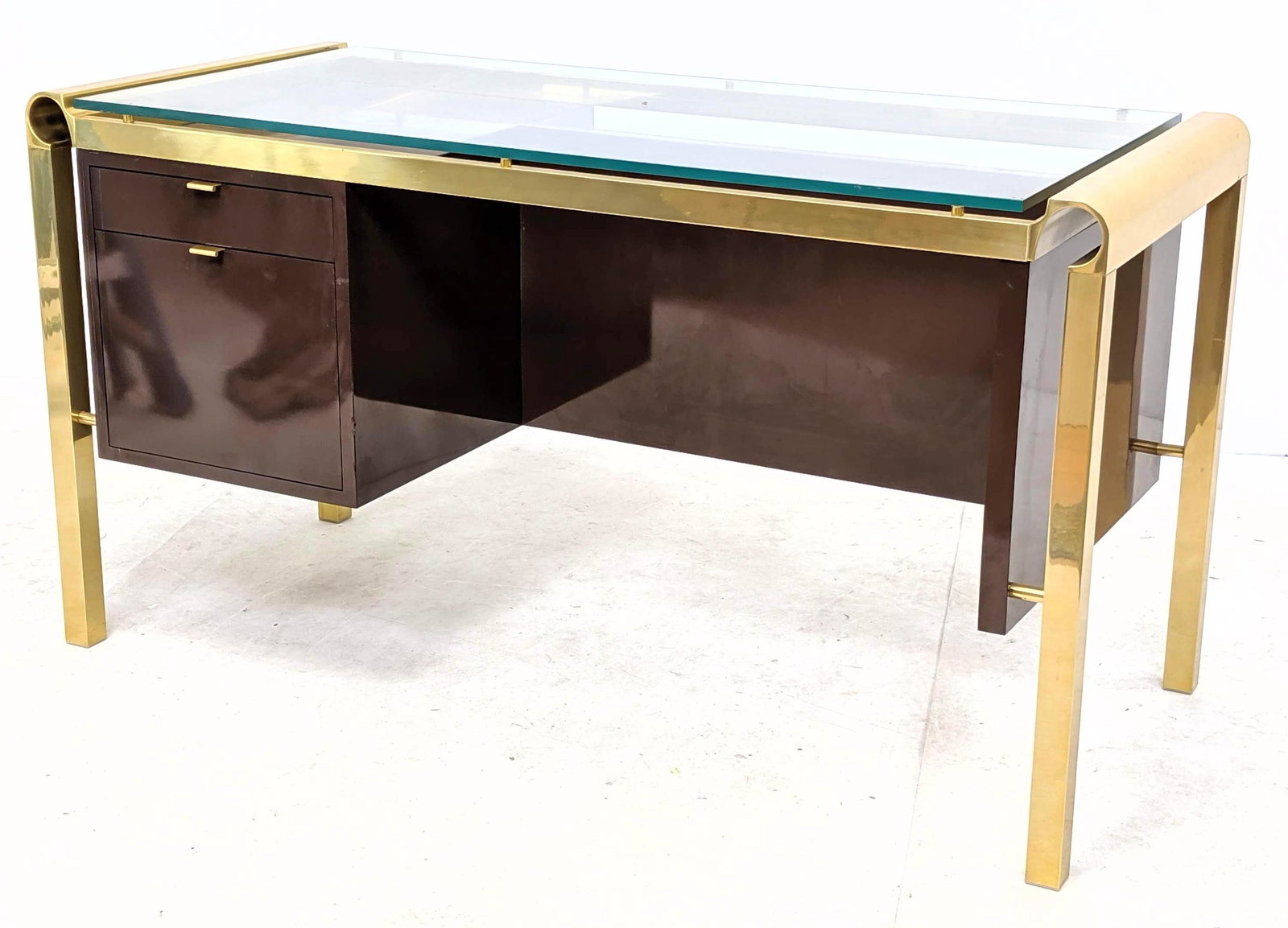 Pierre Cardin Style Brass and Glass Desk. Stylish brass: Pierre Cardin Style Brass and Glass Desk. Stylish brass frame with suspended plum laminate. Glass top. -- Dimensions: H: 29.5 inches: W: 54.5 inches: D: 24 inches ---