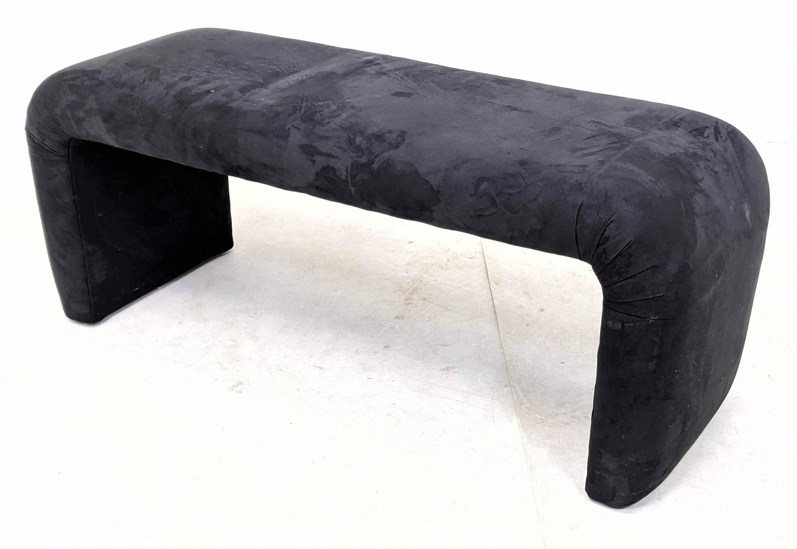 Decorator Waterfall Form Black Suede Bench Ottoman. (1 of 7)