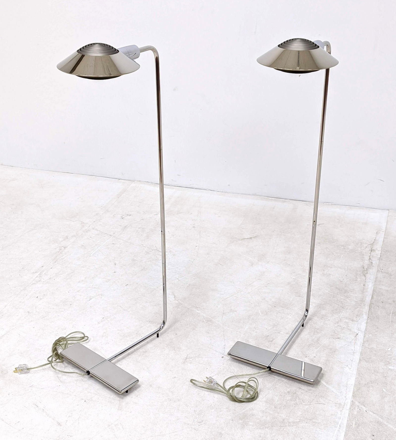Pr CEDRIC HARTMAN Chrome Cantilever Floor Lamps. 900195: Pr CEDRIC HARTMAN Chrome Cantilever Floor Lamps. 900195. Stepped diffusers. Made in USA. Marked.-- Dimensions: H: 38 inches: W: 11 inches: D: 26 inches ---