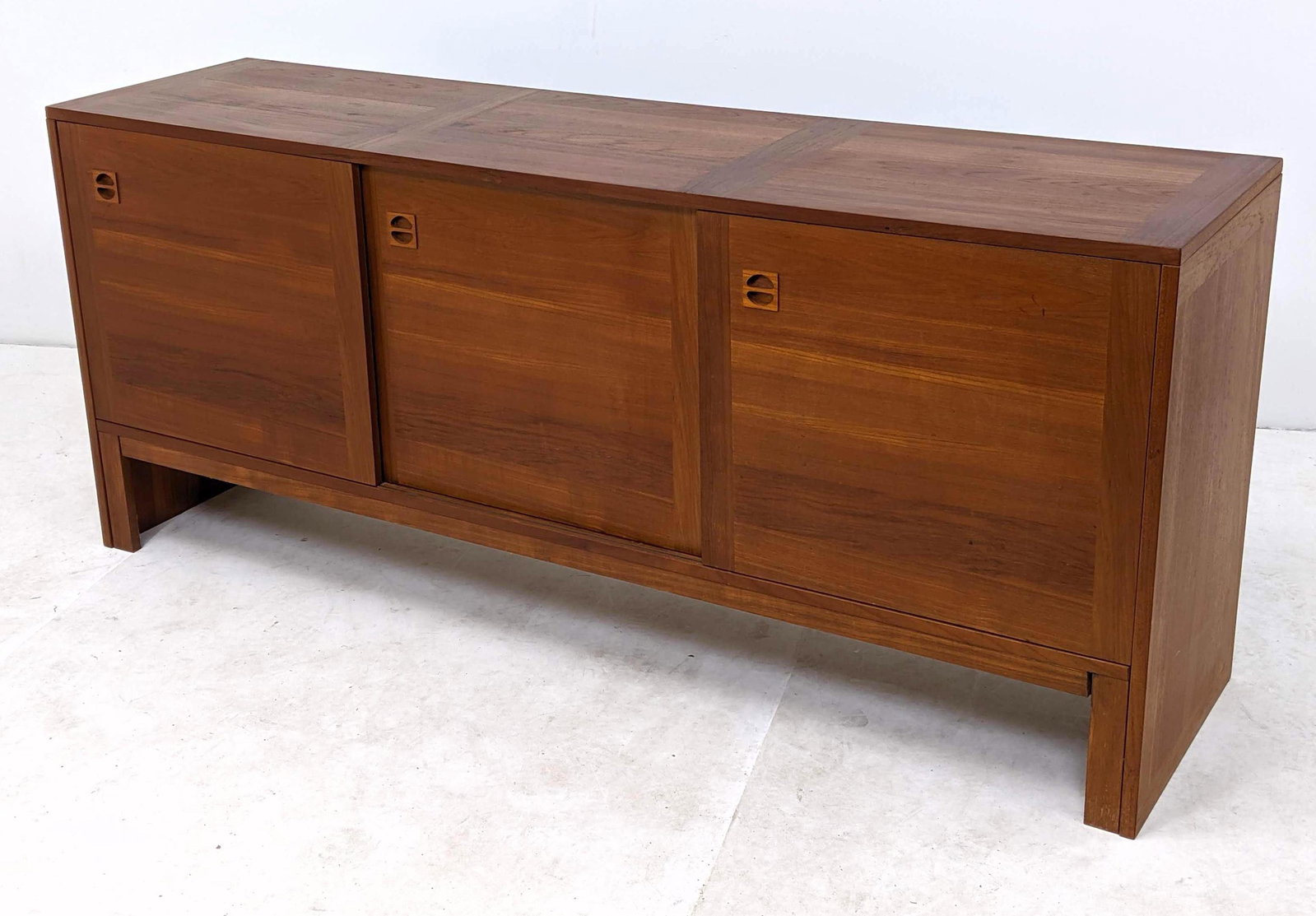 Danish Modern Teak Credenza Side Board with Sculpted ha: Danish Modern Teak Credenza Side Board with Sculpted handles.-- Dimensions: H: 30.5 inches: W: 71 inches: D: 18.5 inches ---
