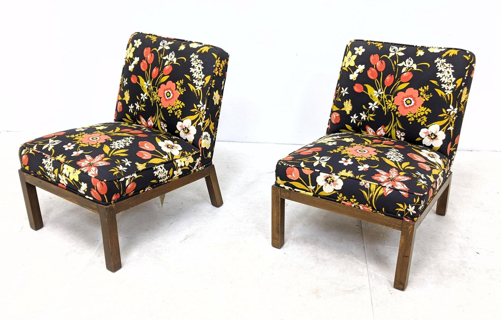 Pr Dunbar style Square Leg Slipper Lounge Chairs. Flora: Pr Dunbar style Square Leg Slipper Lounge Chairs. Floral upholstery.-- Dimensions: H: 30.5 inches: W: 22.5 inches: D: 29 inches ---