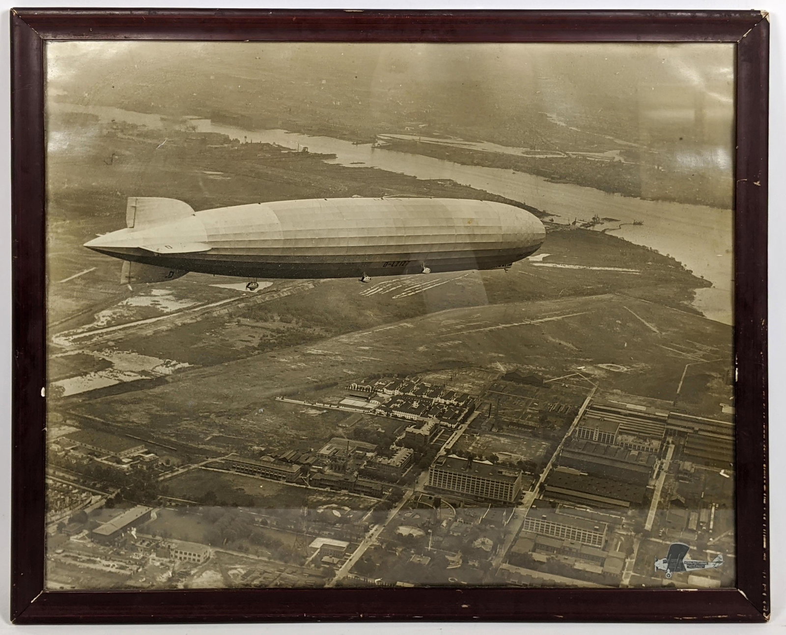 VICTOR DALLIN Arial Photograph GRAF ZEPPELIN. Black and: VICTOR DALLIN Arial Photograph GRAF ZEPPELIN. Black and white photograph. Graf zeppelin shown above industrial landscape. -- Dimensions: H: 15.75 inches: W: 19.5 inches ---