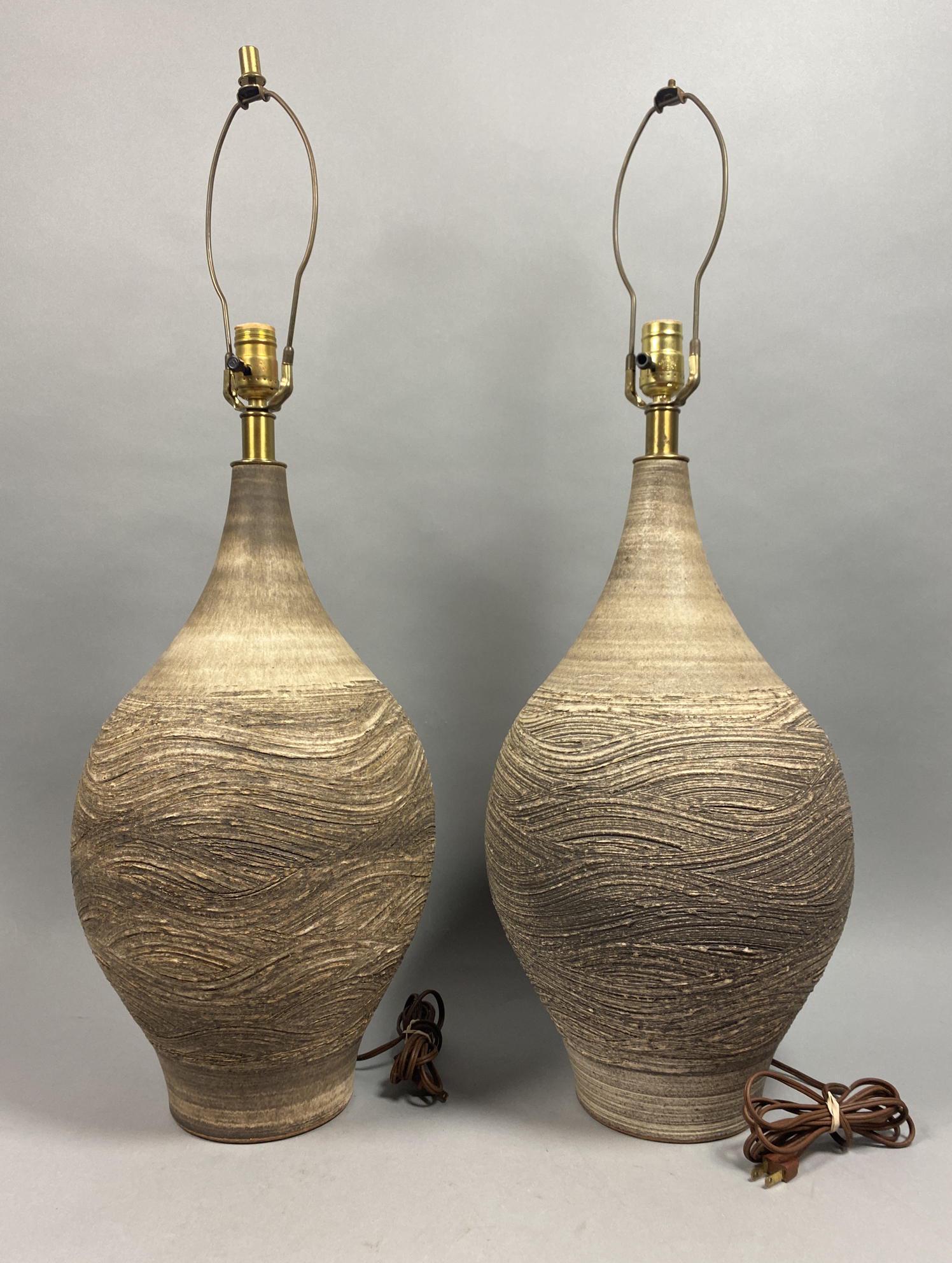 Pr LEE ROSEN for DESIGN TECHNICS Ceramic Art Pottery La: Pr LEE ROSEN for DESIGN TECHNICS Ceramic Art Pottery Lamps. Taupe studio pottery lights with bulbous form. Stamp signature mark. -- Dimensions: H: 32 inches: W: 10 inches: D: 10 inches ---