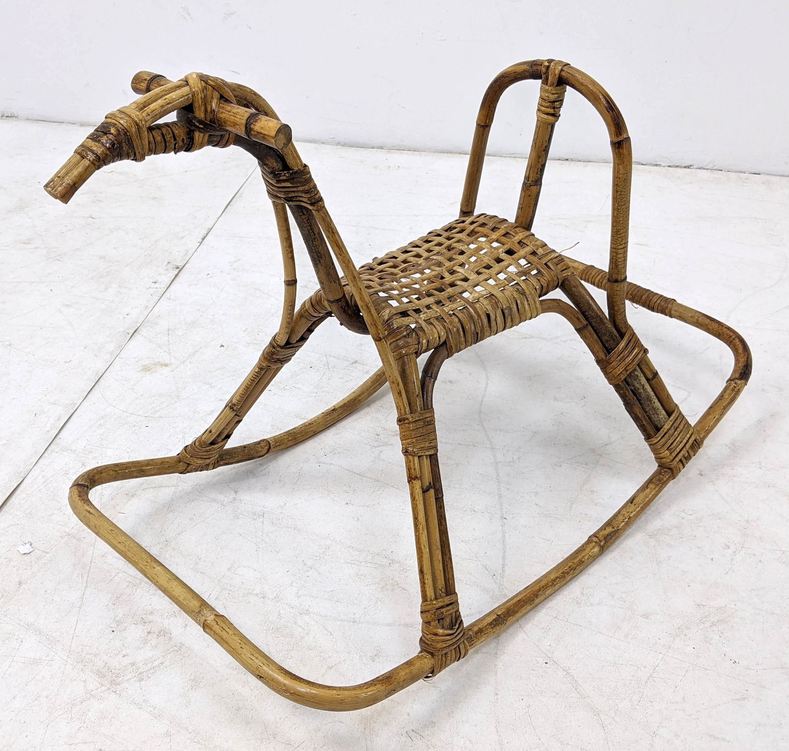 FRANCO ALBINI Woven Rattan Rocking Horse.: FRANCO ALBINI Woven Rattan Rocking Horse. -- Dimensions: H: 21 inches: W: 18 inches: D: 30 inches ---