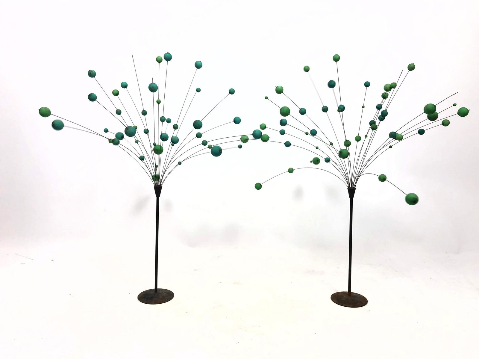 2 LAURIDS LONBORG Kinetic Ball Sculptures. Green & Blue: 2 LAURIDS LONBORG Kinetic Ball Sculptures. Green & Blue plastic balls supported by black metal stand on thin wires. Marked.-- Dimensions: H: 18 inches: W: 16 inches: D: 16 inches ---