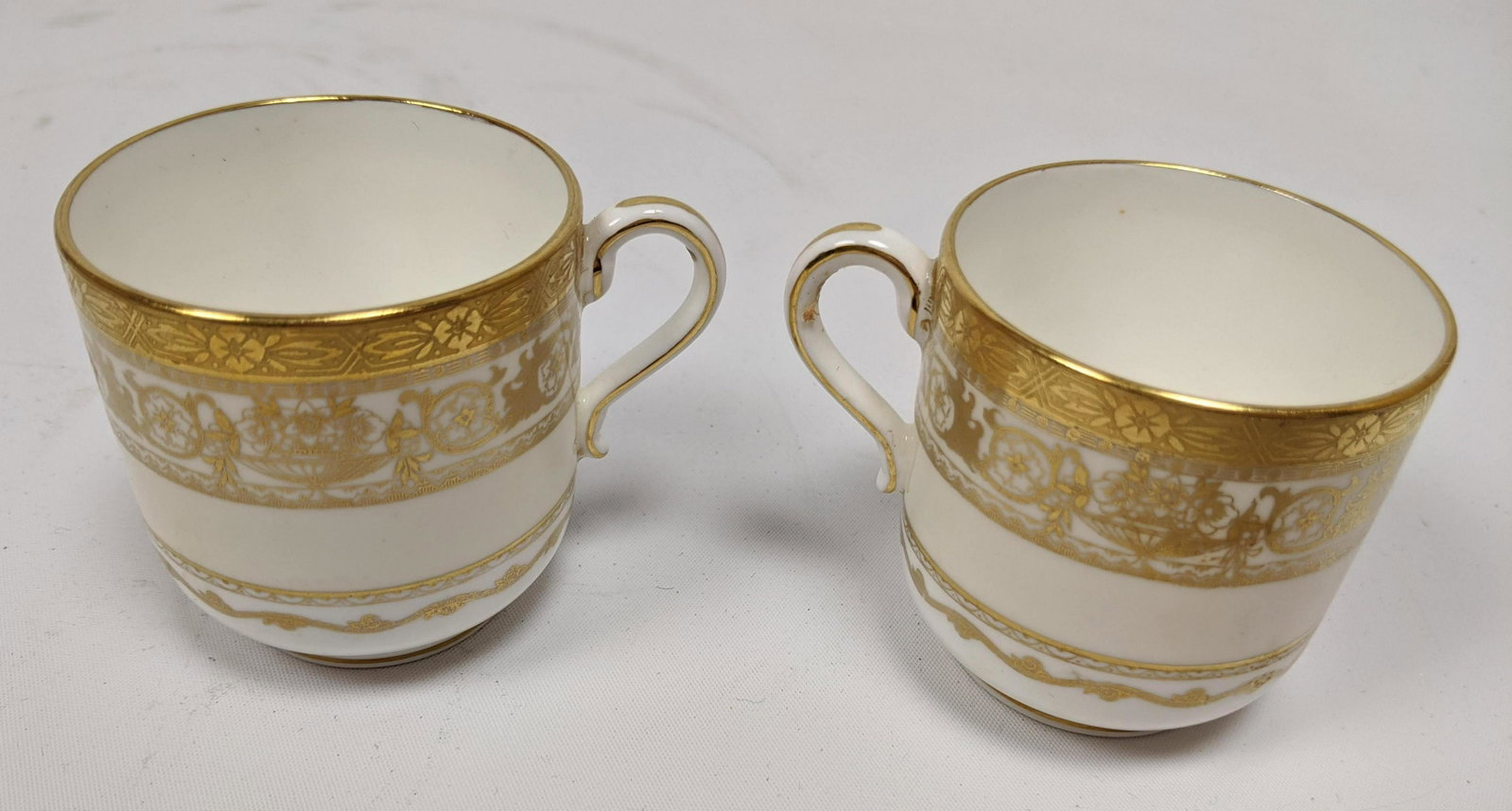 12pc MINTONS for TIFFANY & CO. Demitasse cups. Multi Go: 12pc MINTONS for TIFFANY & CO. Demitasse cups. Multi Gold Banded Design. -- Dimensions: H: 2.5 inches: W: 3 inches: D: 2.25 inches ---