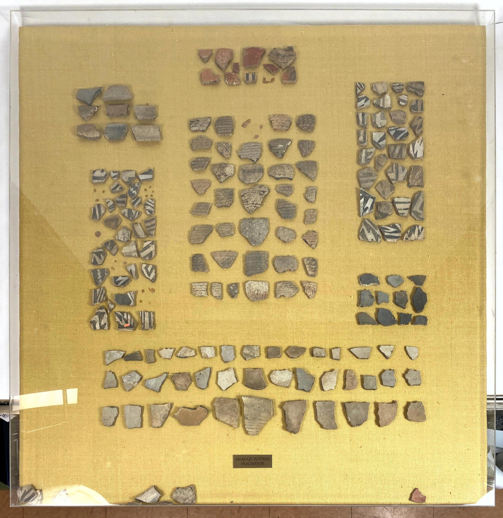 Framed ANASAZI Pottery Fragments. In deep plexiglass f: Framed ANASAZI Pottery Fragments. In deep plexiglass frame. -- Dimensions: H: 37 inches: W: 36.5 inches: D: 2 inches ---
