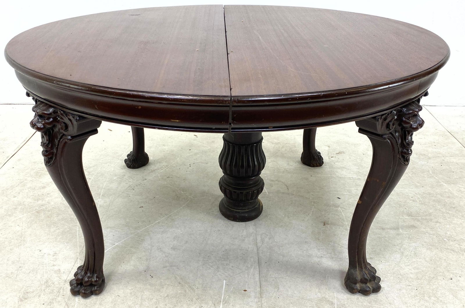 Victorian Era Round Dining Table with Lion head Knees. (1 of 13)
