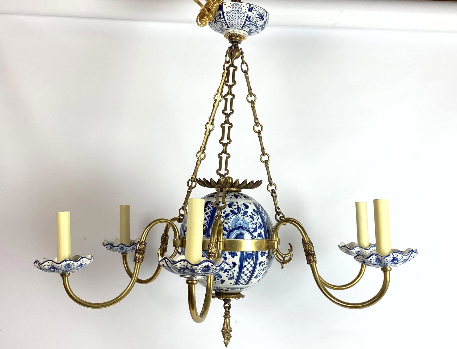 Delft Blue and White Porcelain Chandelier with Brass Ar: Delft Blue and White Porcelain Chandelier with Brass Arms.-- Dimensions: H: 24 inches: W: 25 inches: D: 25 inches ---