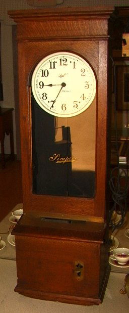 Simplex Time Recorder Co. Antique Oak Time Clock E: Simplex Time Recorder Co. Antique Oak Time Clock Electric No key Dimensions: H: 48 inches: W: 16 inches: D: 7 inches Condition (General) Please contact us for a detailed condition report: Good Conditi
