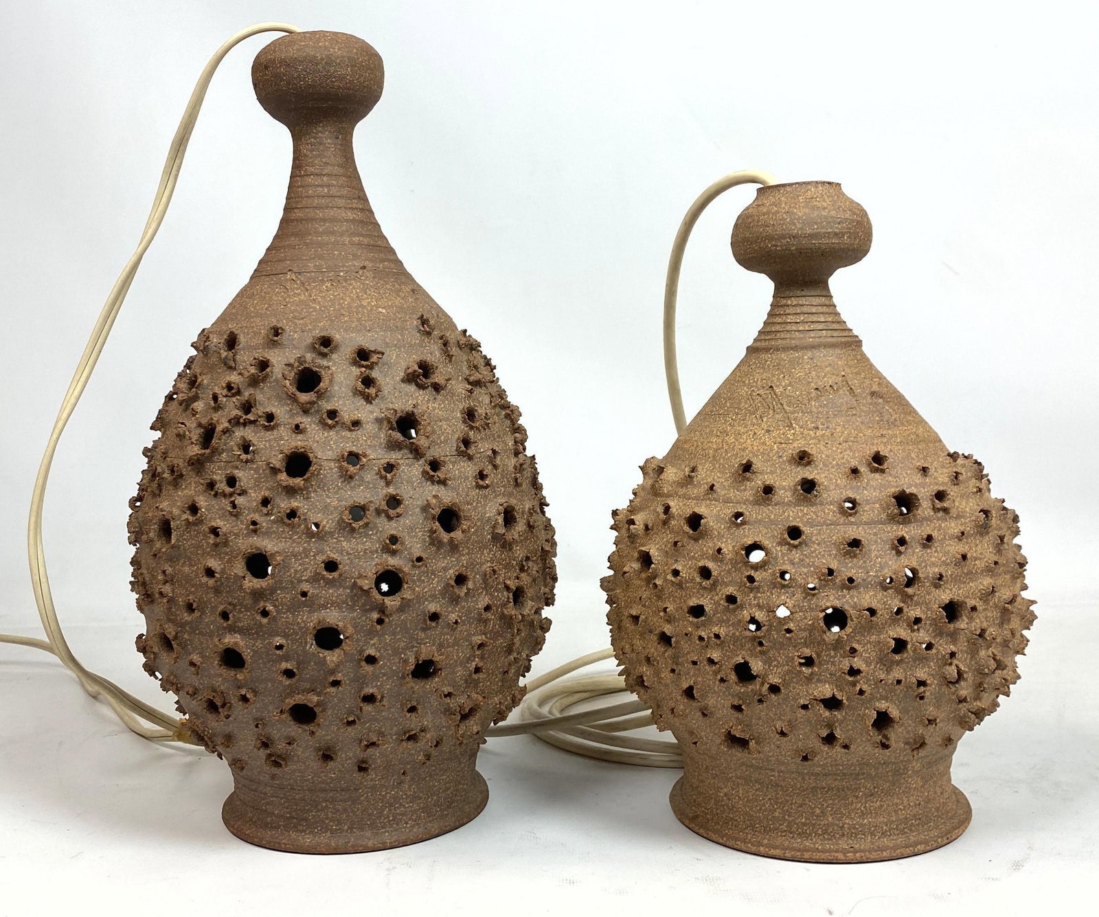 2pcs Massan Pendant Light Lamps. Turned & P: 2pcs Massan Pendant Light Lamps. Turned & Pierced Brown Ceramic Lights. Signed.-- Dimensions: H: 15 inches: W: 9 inches: D: 9 inches ---