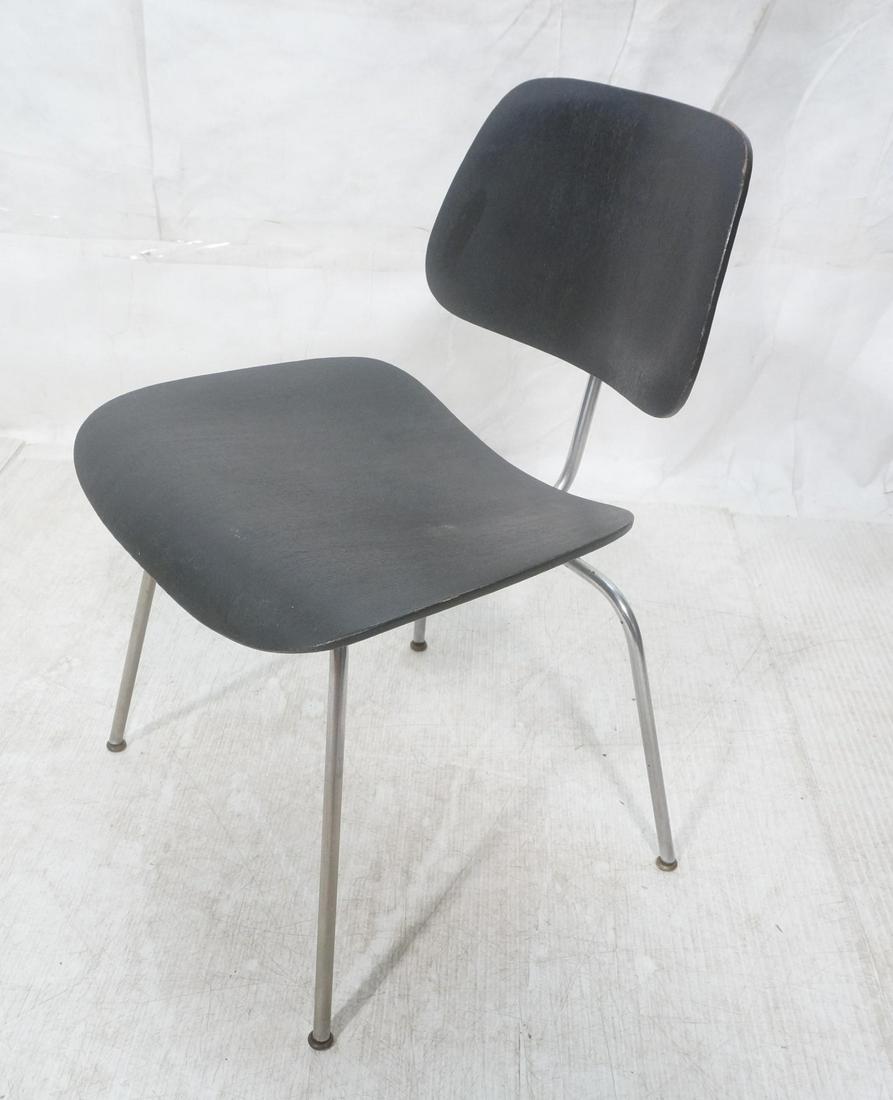 CHARLES EAMES Ebonized DCM Dining Chair. Chrome Tube le: CHARLES EAMES Ebonized DCM Dining Chair. Chrome Tube legs. -- Dimensions: H: 29 inches: W: 19 inches: D: 20.75 inches ---