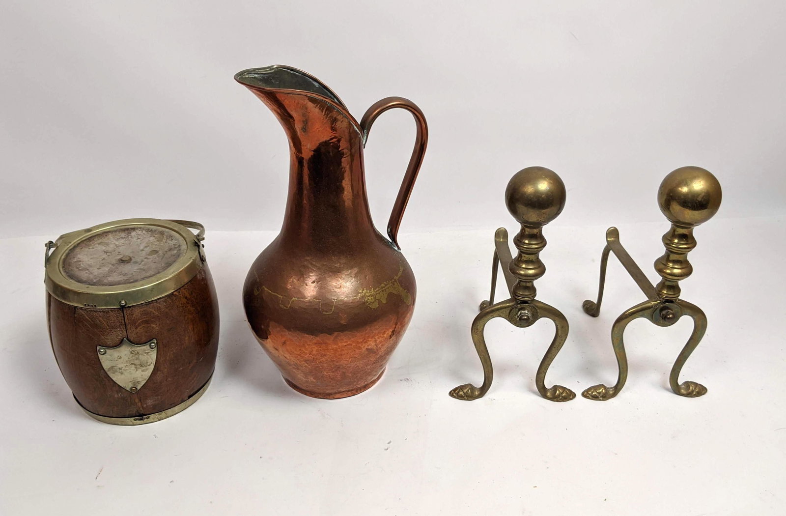 Antique Metal Lot. Tobacco Jar Pitcher small Andirons.: Antique Metal Lot. Tobacco Jar Pitcher small Andirons.-- Dimensions: --- These group lots are sold AS IS and have only been minimally inspected. Bidders should expect there could be damage on items th