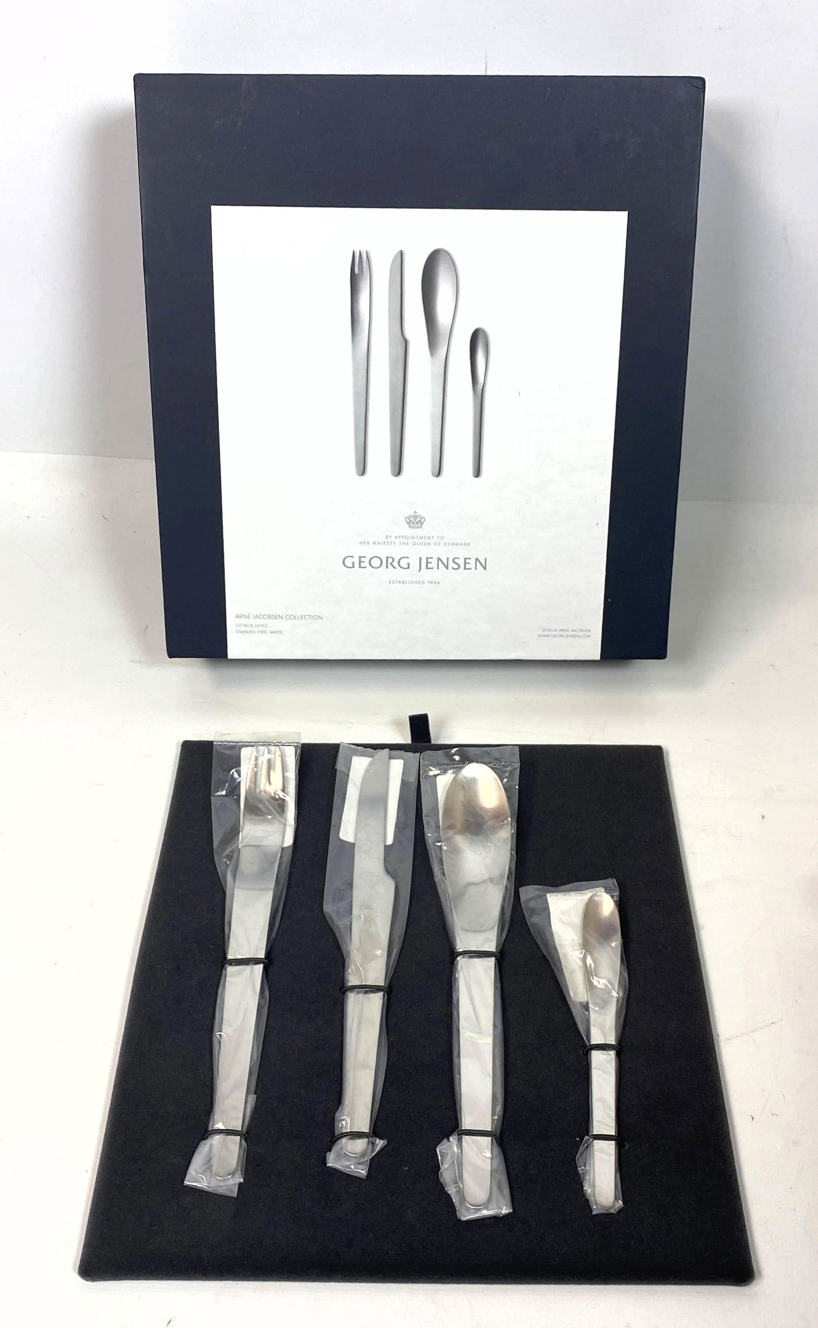 GEORG JENSEN Stainless Flatware Set. New in Box. Servic (1 of 4)