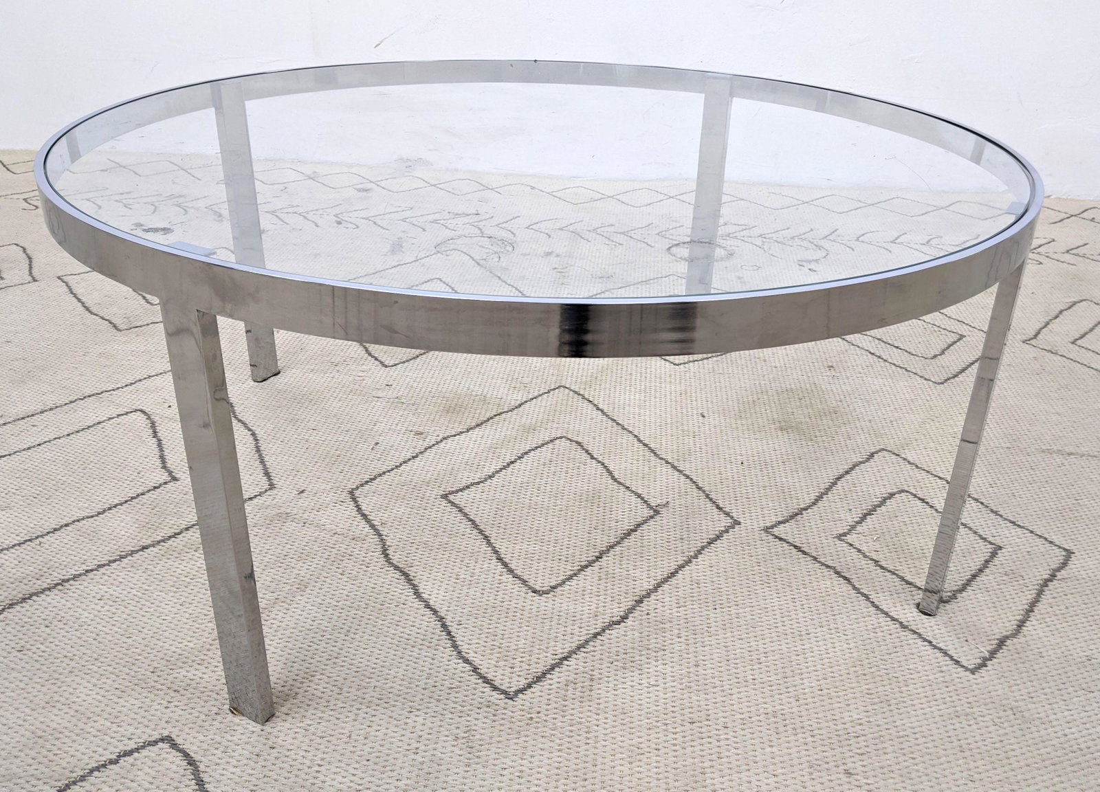 Stainless Steel and Glass Coffee Cocktail Table. Inset: Stainless Steel and Glass Coffee Cocktail Table. Inset glass top.-- Dimensions: H: 16.5 inches: W: 38 inches: D: 38 inches ---