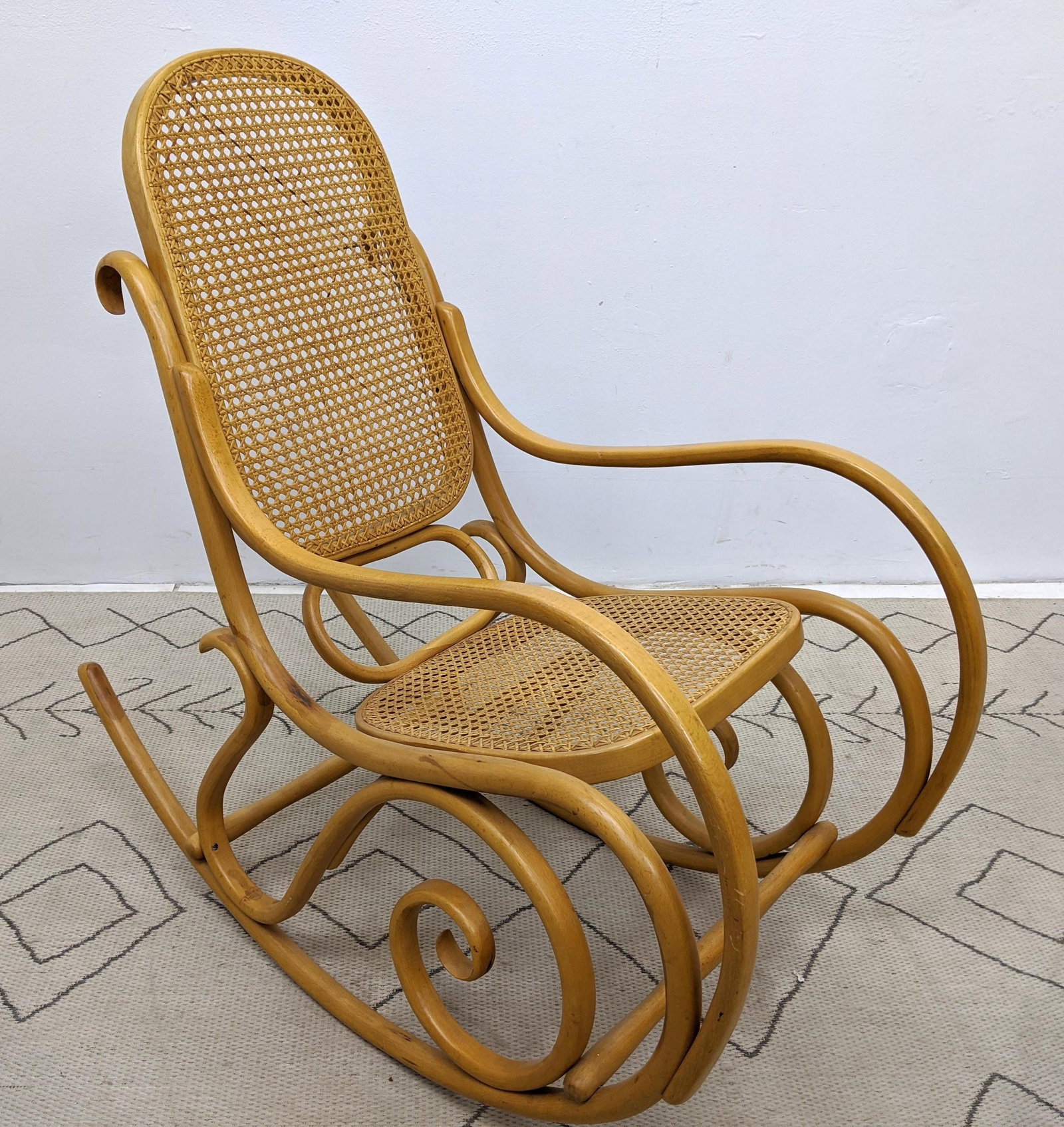 Bent wood and Cane Rocking Chair.: Bent wood and Cane Rocking Chair.-- Dimensions: H: 40 inches: W: 20.5 inches: D: 41.5 inches ---