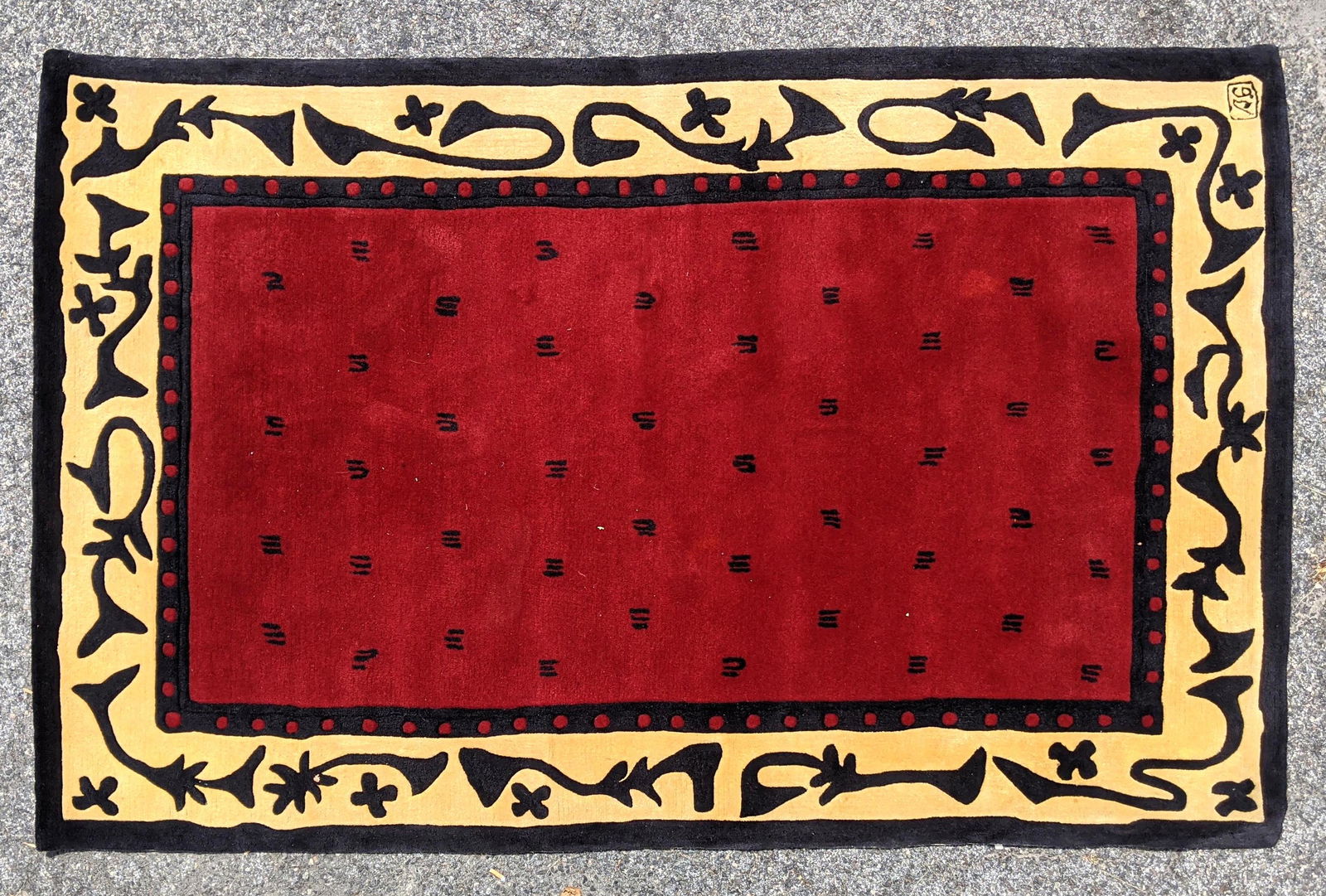 8Õ10x5Õ9 Burgundy carpet with tan border. Signed (1 of 7)