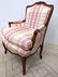 Country French Arm Lounge Chair. Carved frame.