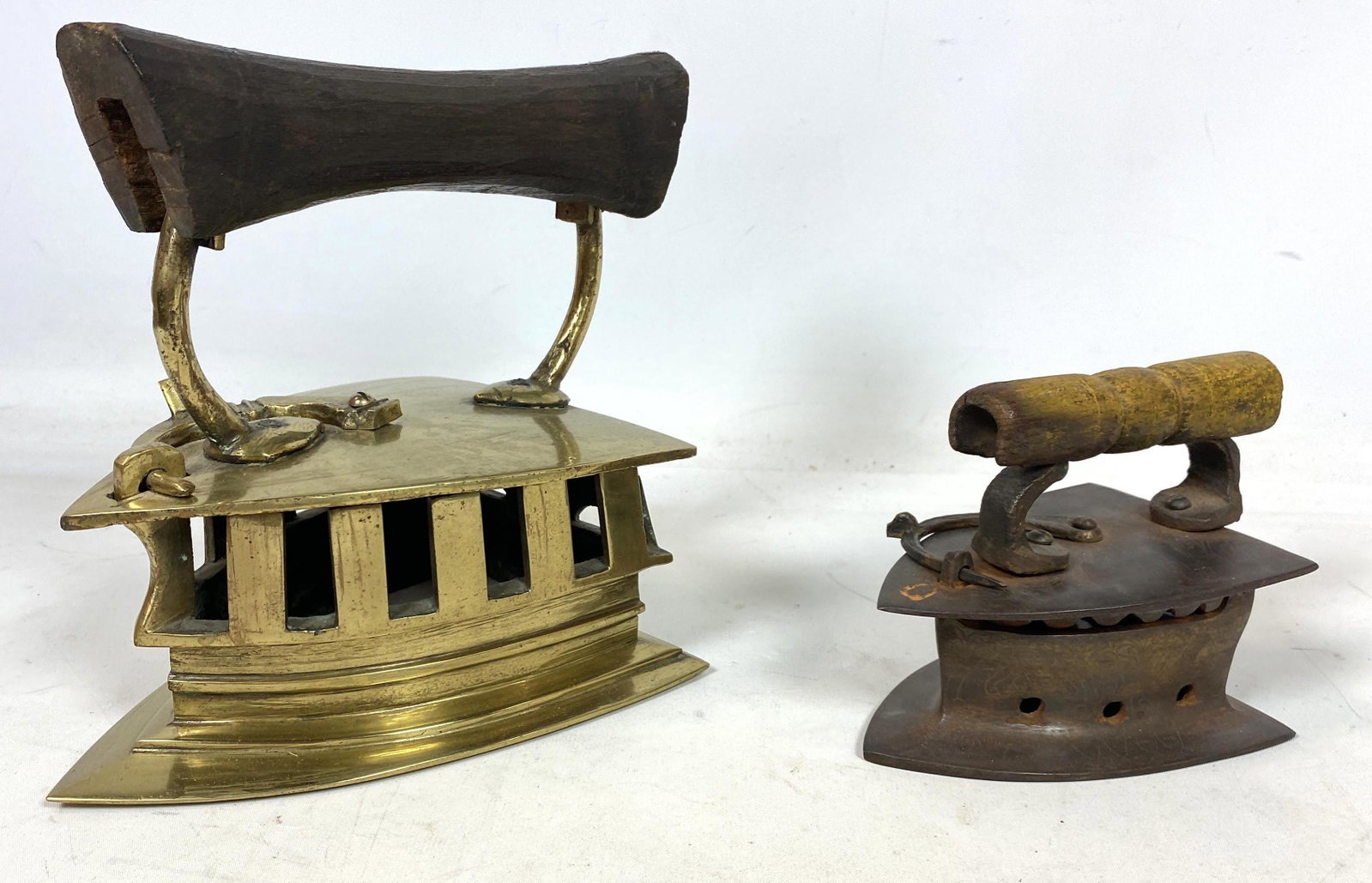 2pcs Antique Irons. Chinese Brass and Cast Iron.: 2pcs Antique Irons. Chinese Brass and Cast Iron.-- Dimensions: --- US Shipping charge: $35 Plus insurance at a rate of $1 per hundred.