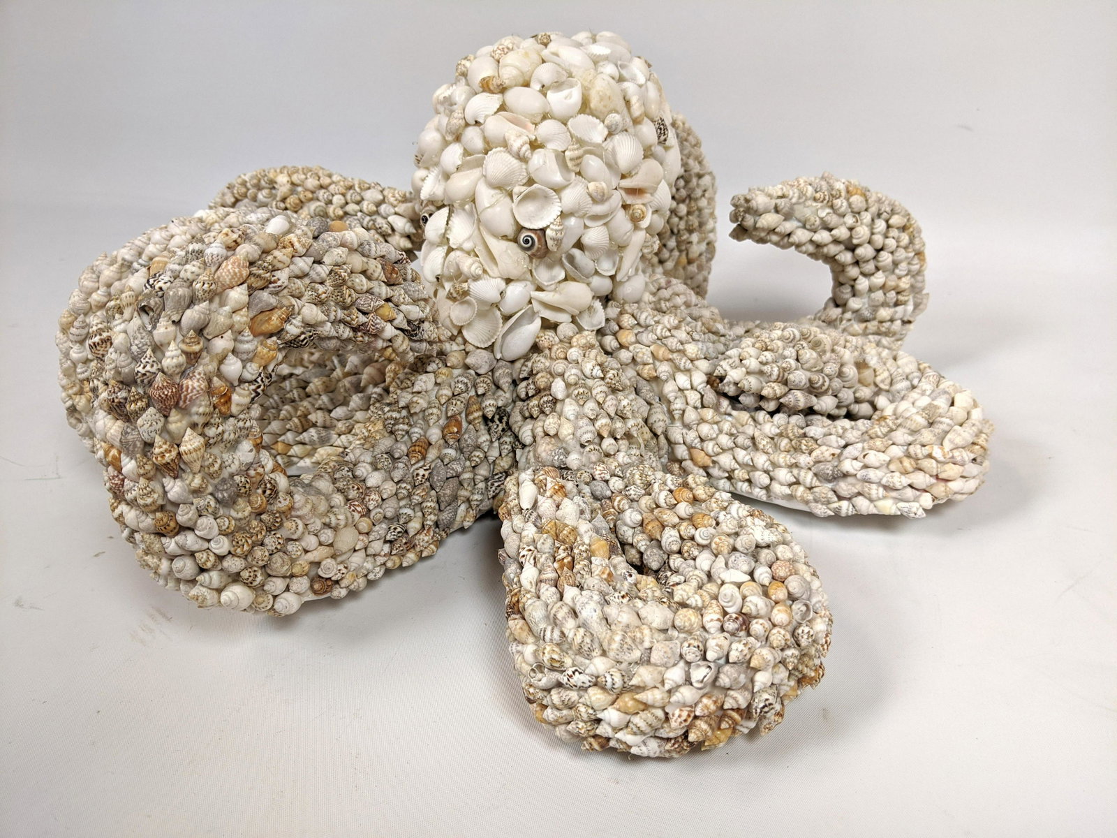 Decorative Seashell Octopus Sculpture.: Decorative Seashell Octopus Sculpture.-- Dimensions: H: 7 inches: W: 14 inches: D: 15 inches ---